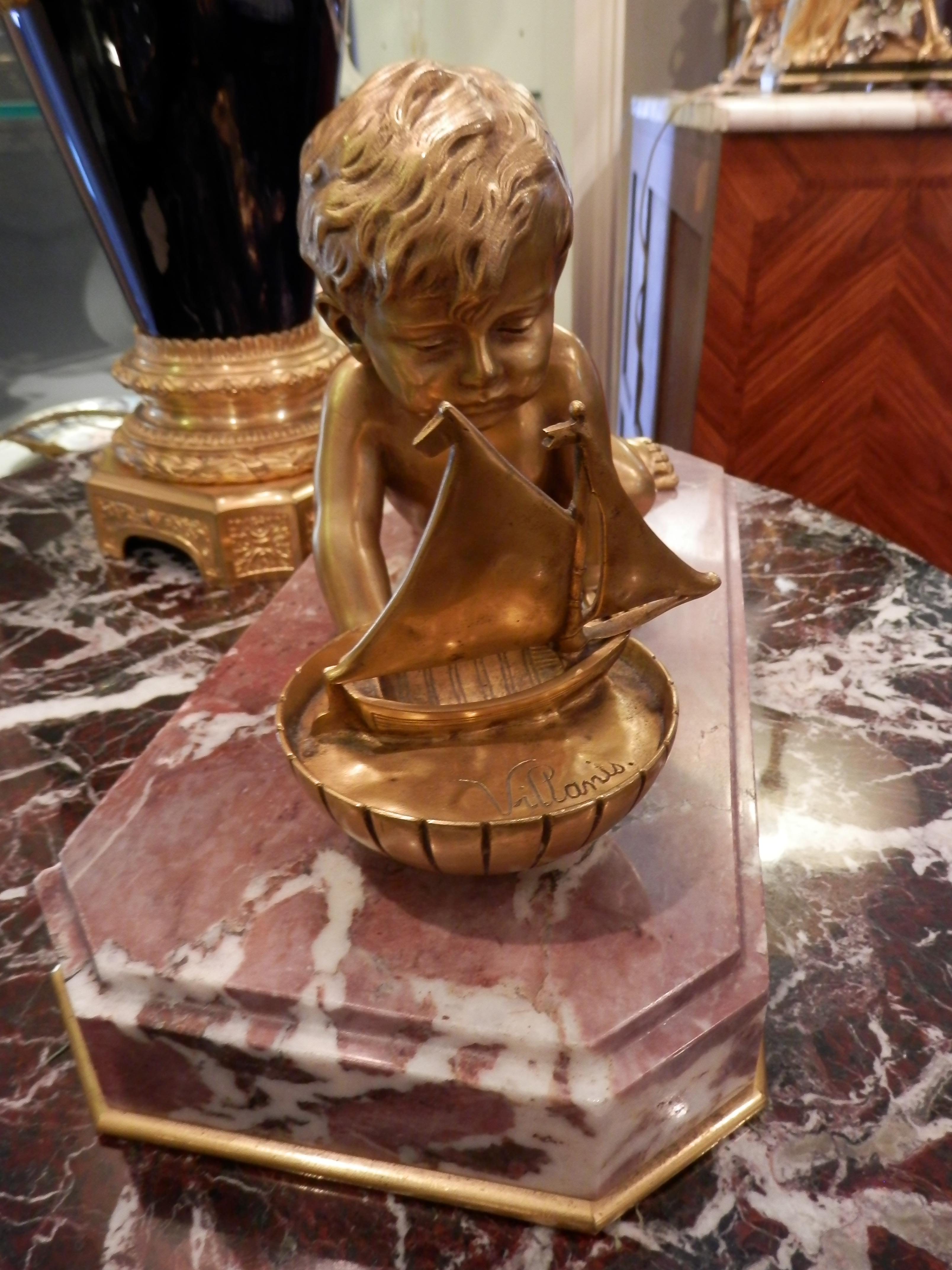 19th Century Large Gilt Bronze Cherub Playing with His Toy Boat on a Marble Base In Good Condition For Sale In Dallas, TX