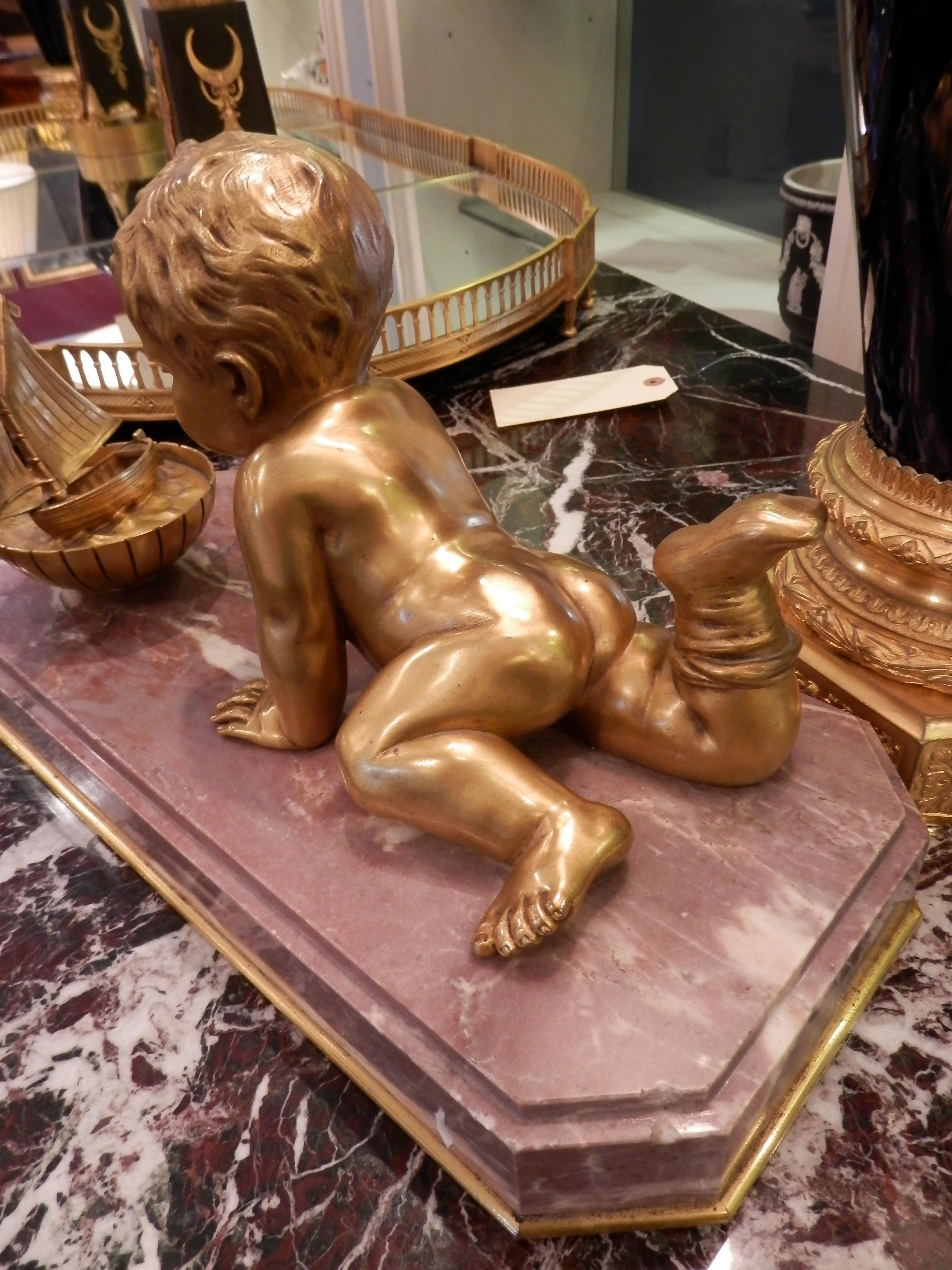 19th Century Large Gilt Bronze Cherub Playing with His Toy Boat on a Marble Base For Sale 1