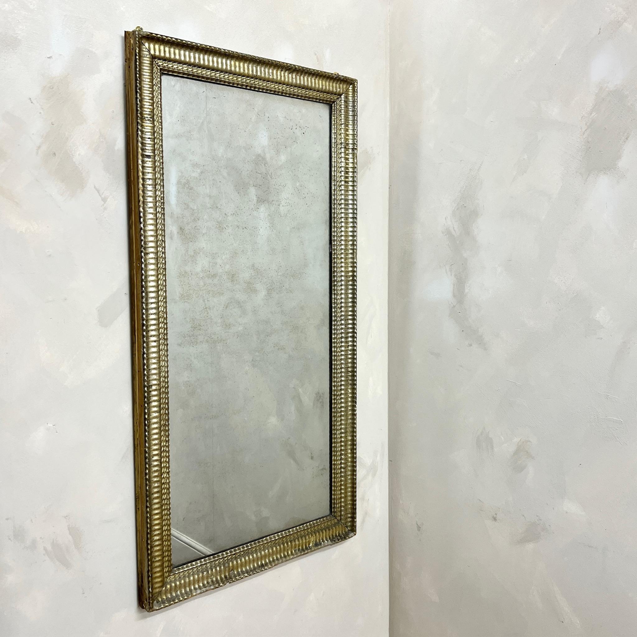 Large, 19th Century, Gilt Ribbed Mirror Frame with original mercury plate.

France, circa 1870.
Height - 142 cm
Width - 72.5 cm
Depth -6 cm
Please message if any further info or photos are required 

We are happy to work with you with your choice of
