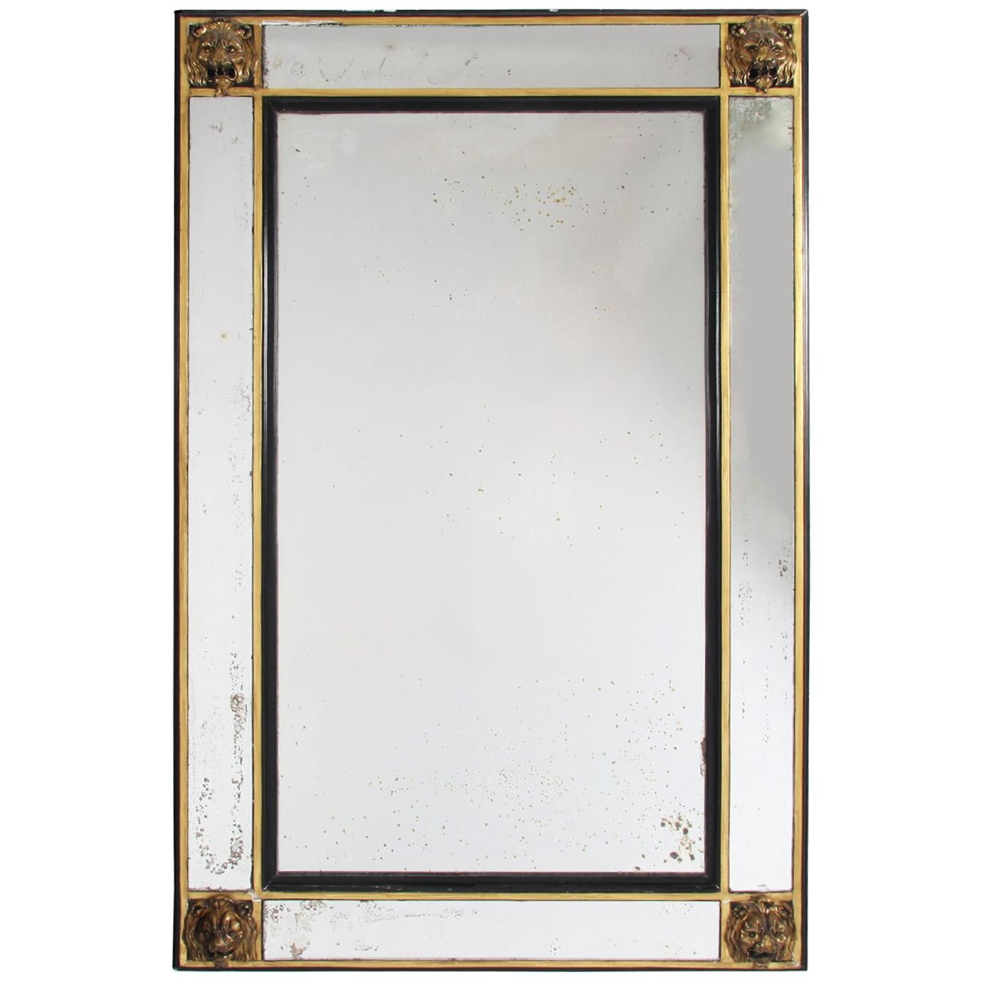 19th Century Large Giltwood and Ebonized Mirror with Lions Heads