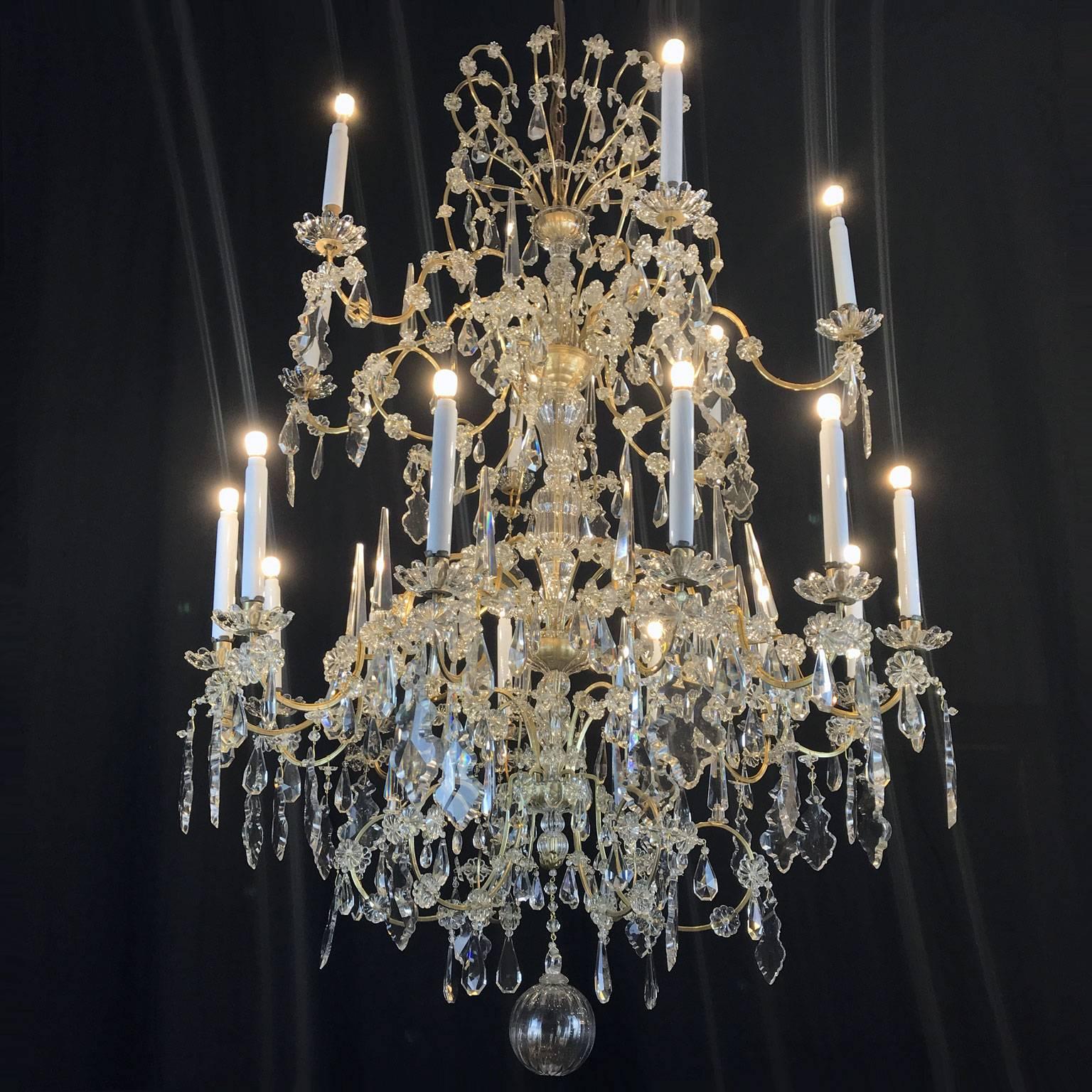 A stunning large Italian crystal chandelier two-tier eighteen-light bronze and crystal chandelier in great condition, coming from the hall of an antique luxury villa at Lake Como, in Northern Italy and dating back to the first decades of 19th