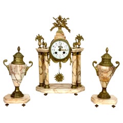Grande garniture d'horloge du 19e siècle en marbre et bronze doré