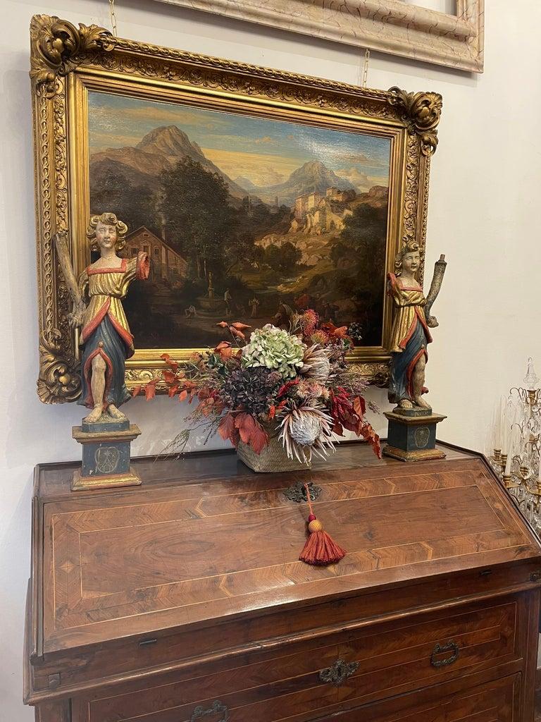 A 19th century large oil on canvas painting, a mountain landscape signed and dated on the lower right Ed.Cohen Weimer, 1866, depicting a beautiful mountain landscape, an Italian Alps mountain valley with a stream, rustics and architectural elements