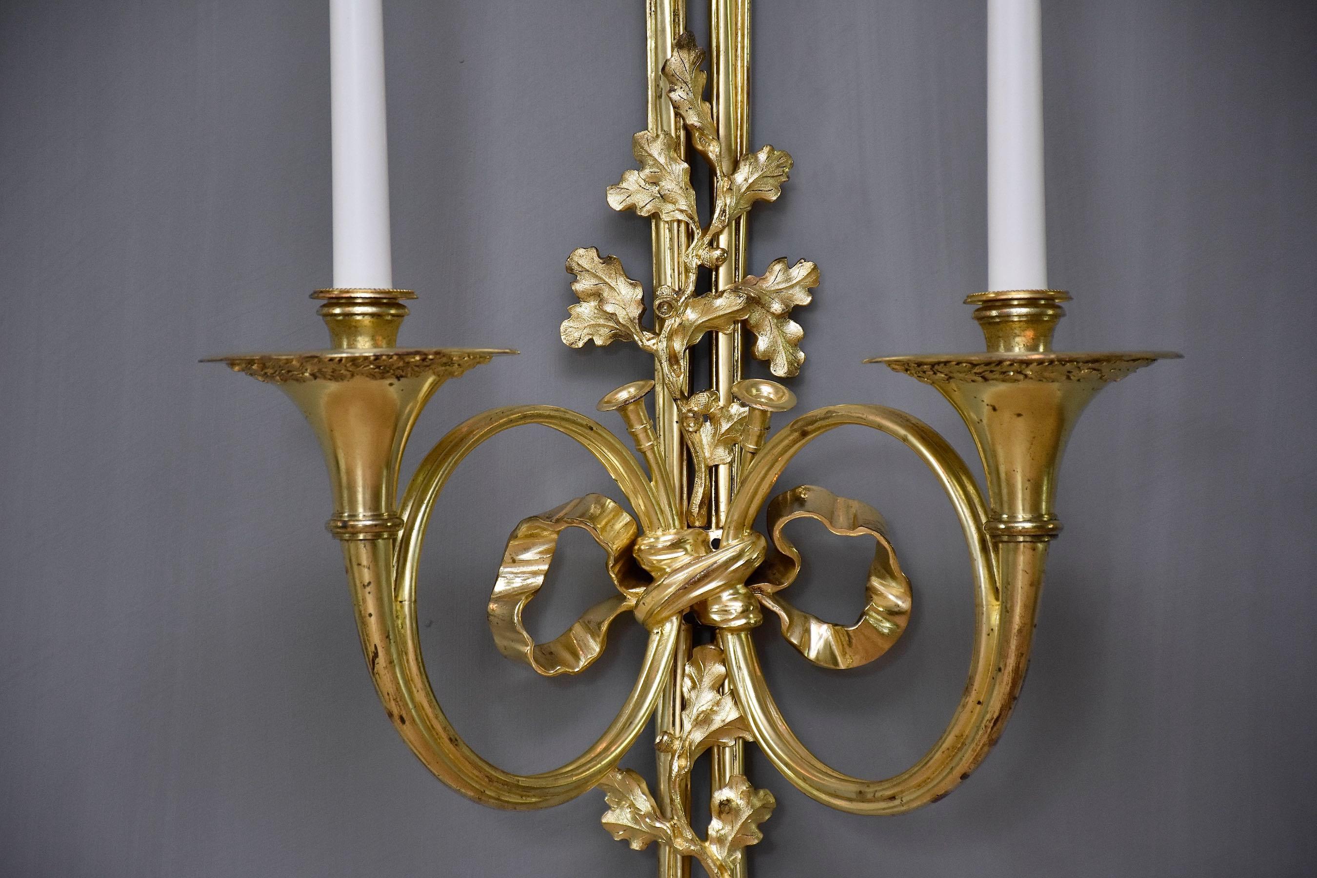 Bronze 19th century large pair of gilt bronze wall lights in the style of Louis XVI For Sale