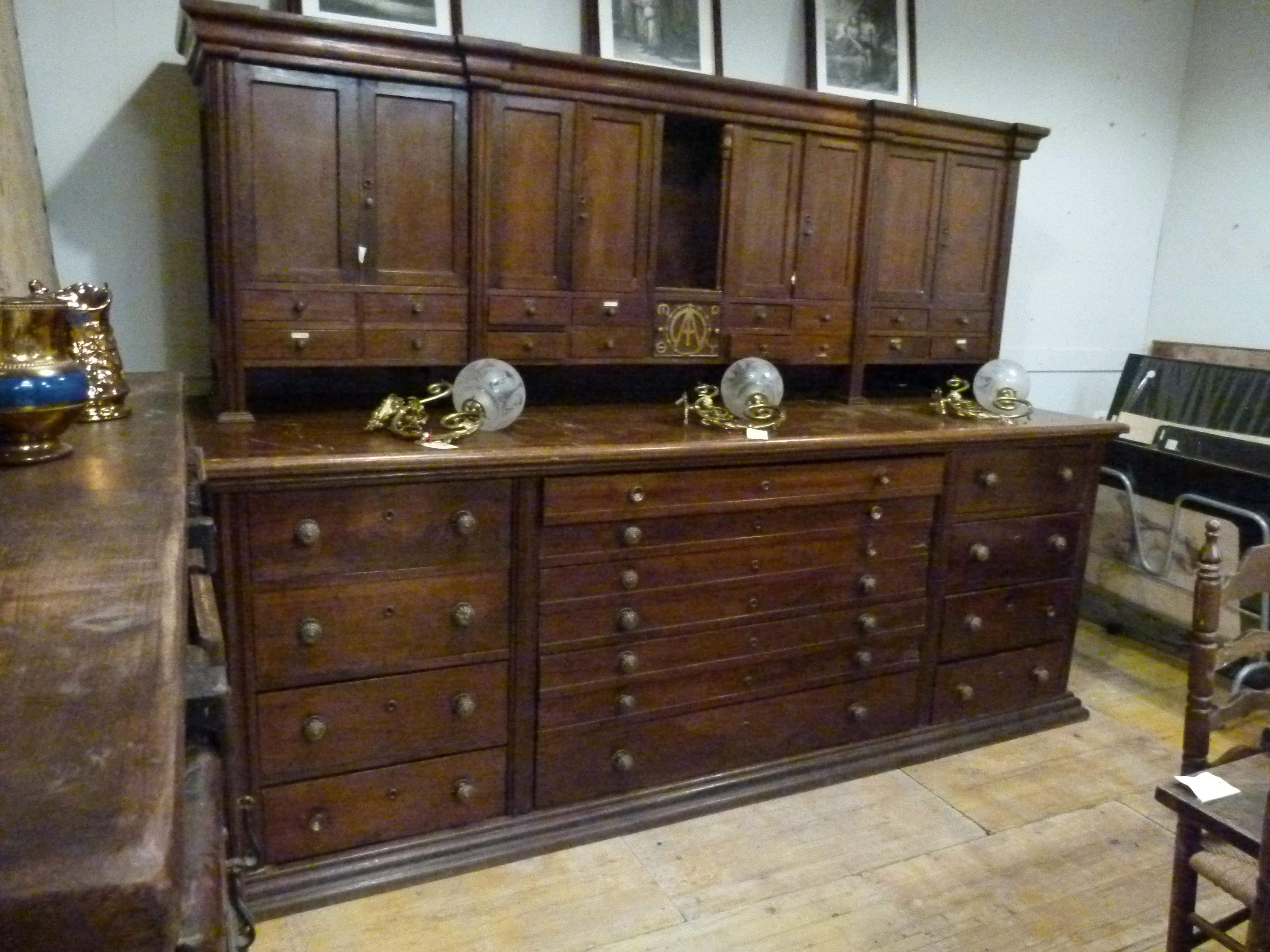 19th Century Large Sacristy Cabinet  meant to store the chasubles. Ideal for big spaces where it could used as  a housekeepers cupboard. 
The upper part can be disassembled from  the lower part  for shipping.

