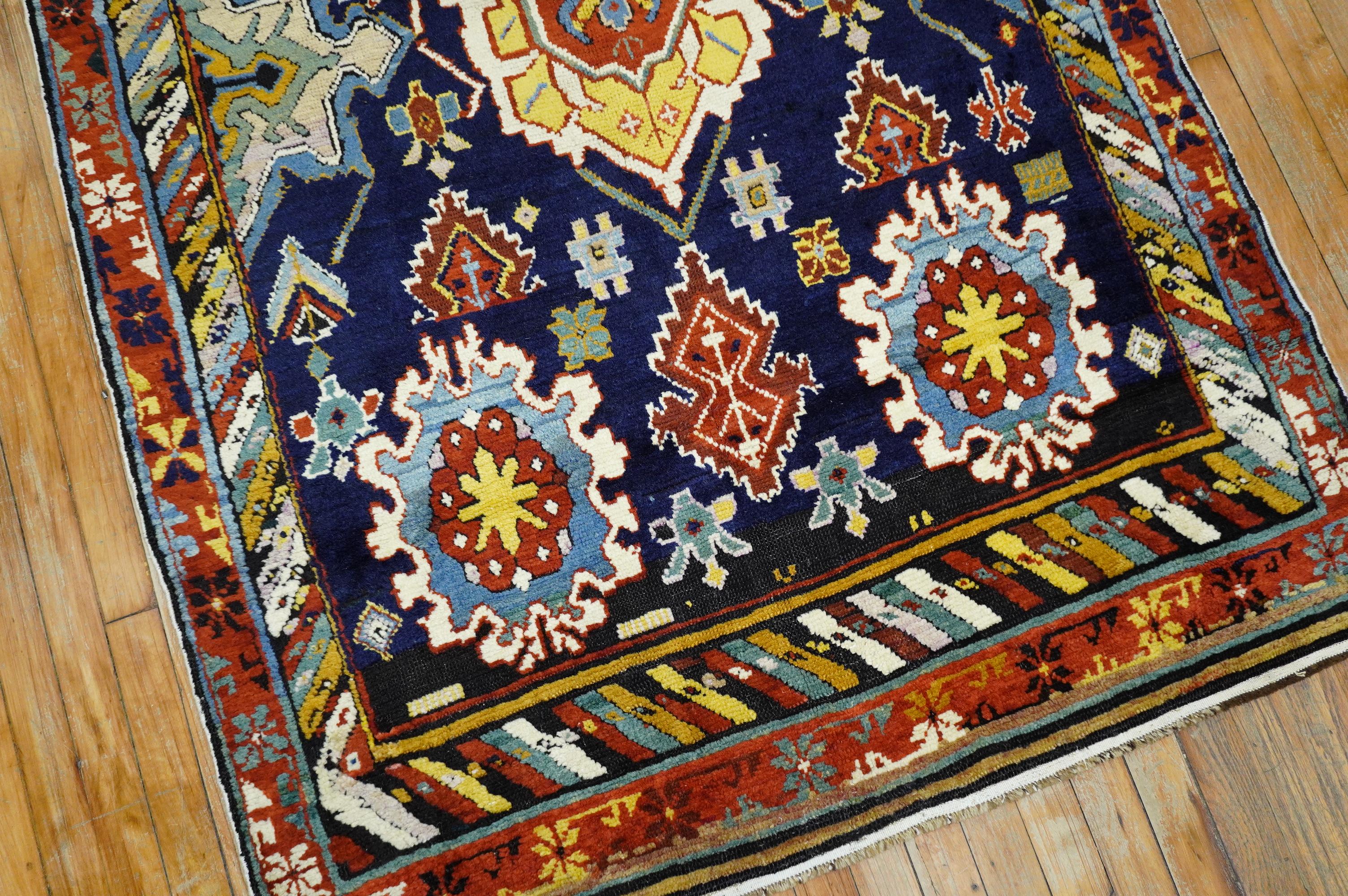 Stunning full pile condition Caucasian Karaghashli Shirvan rug from the late 19th century. Large scale all over motif with jewel tone colors on a deep navy blue ground,

circa 1880, measures: 4' x 9'7