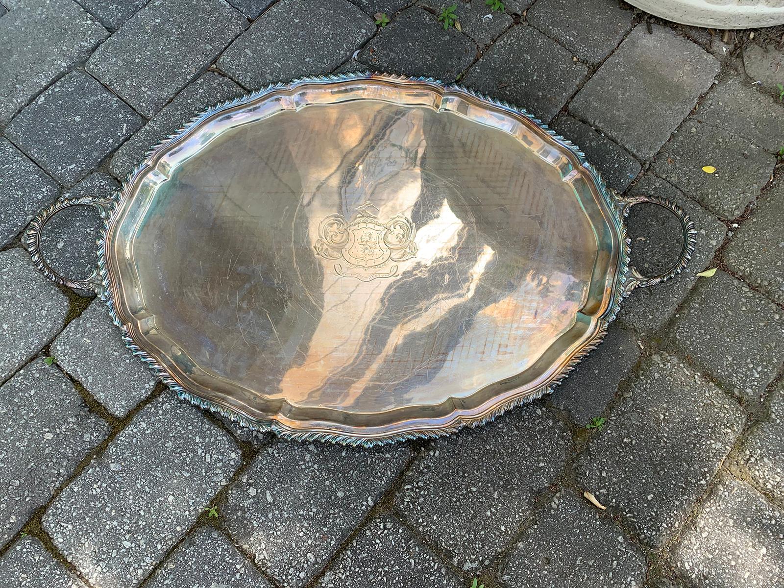 19th century large Sheffield silver plate serving tray with beautiful crest
Blue tinge is the reflection of our turquoise front doors.