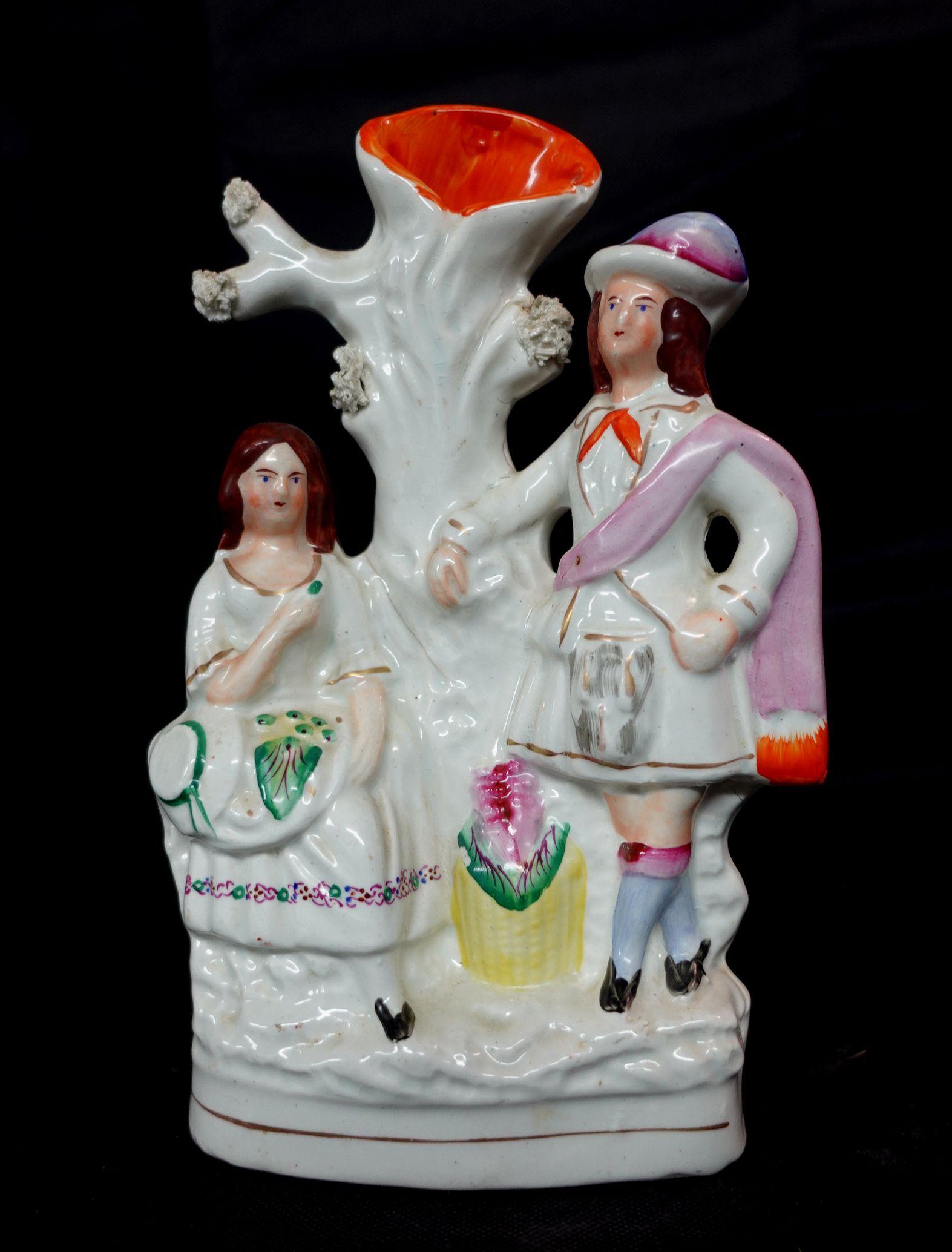 19th century English Staffordshire figure, signed at the bottom.


 