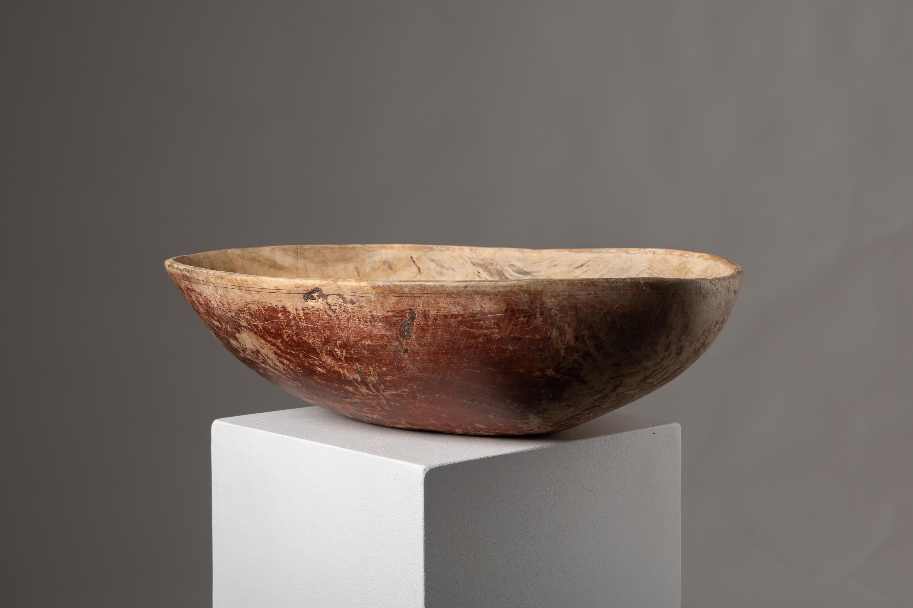 Genuine Swedish root bowl from the 1800s. The wood bowl is in good condition with an authentic patina and organic shape. This bowl is a very large example and fit for both functional and aesthetic purposes. The size ensures it stands out on any