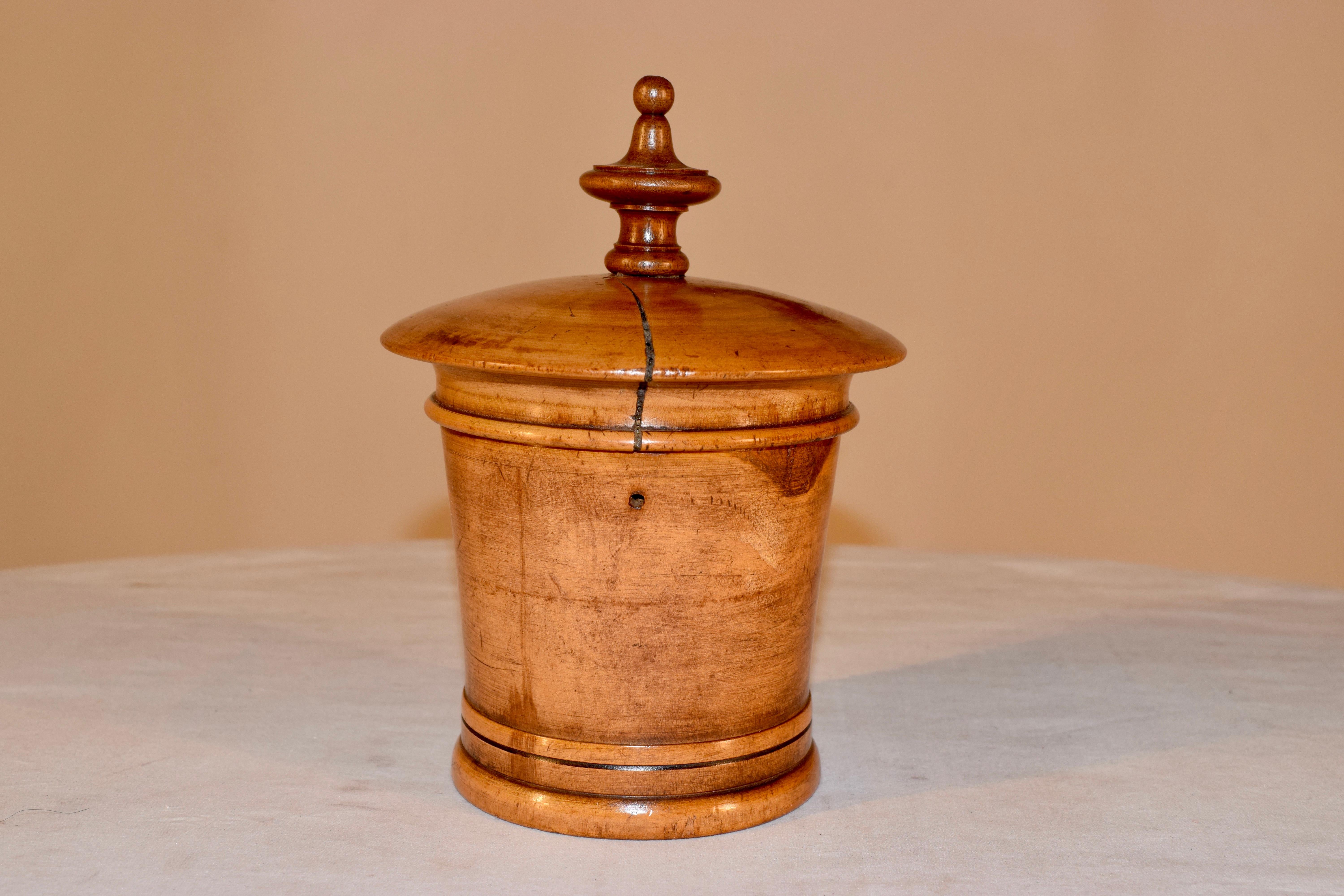 19th century large hand turned treen lidded string box with shrinkage separation in the lid. There is a small hole drilled in the side for the string to be threaded through for easy use.