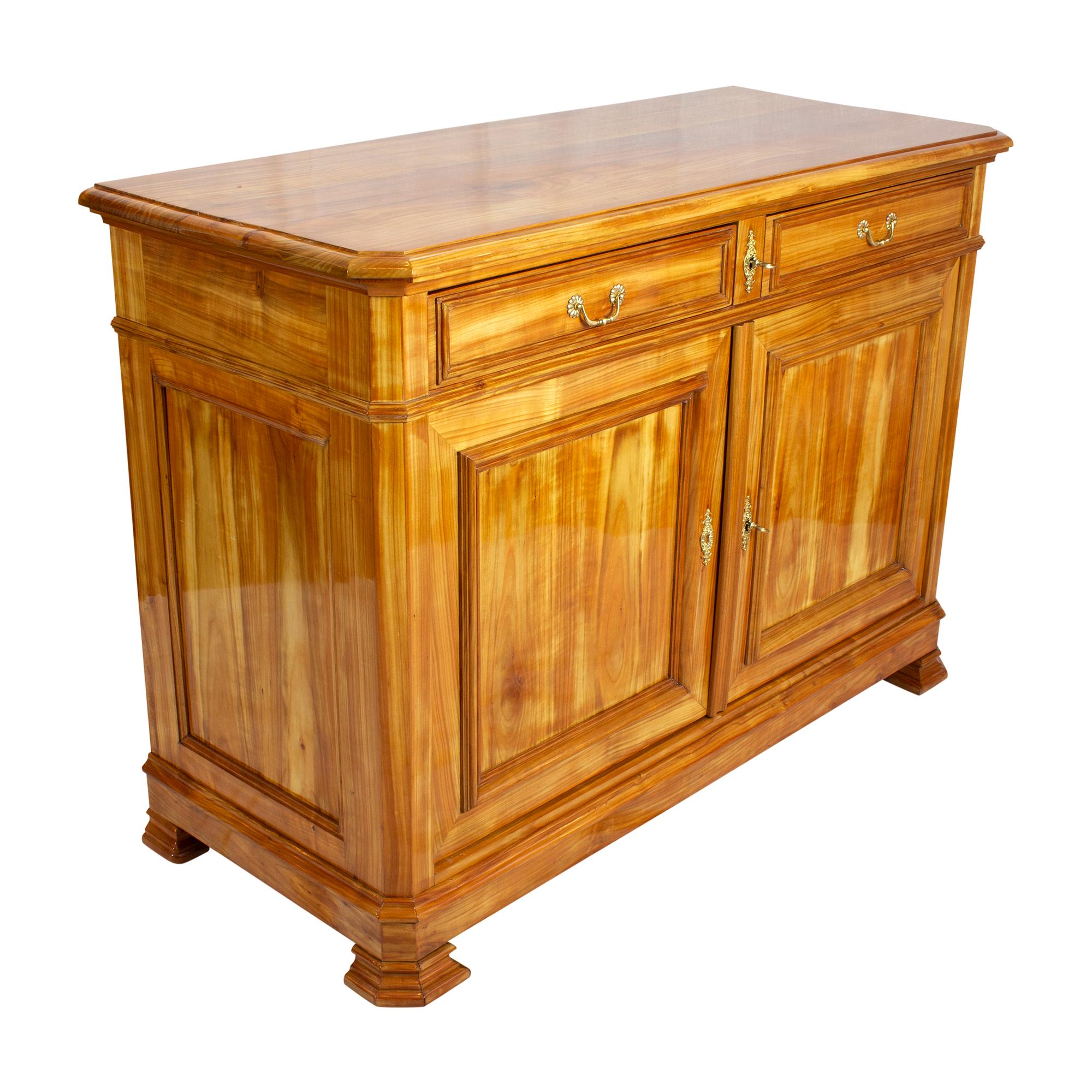 The sideboard originates from Switzerland in the late Biedermeier period around 1850 (transition to historicism). The furniture was made of solid cherrywood. The backside is made of spruce. It can be assumed that it is wild cherry, as the mass is