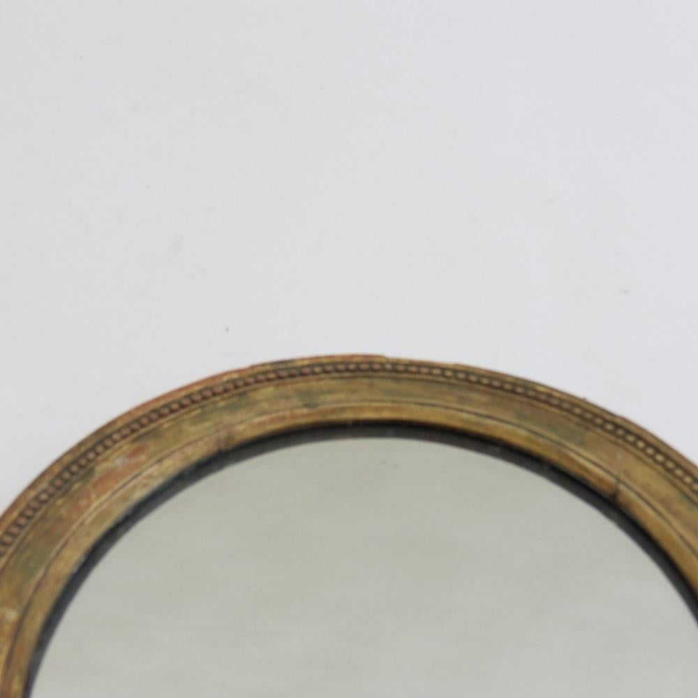 English 19th Century Late Georgian Oval Gilt Wall Mirror Circa 1830s