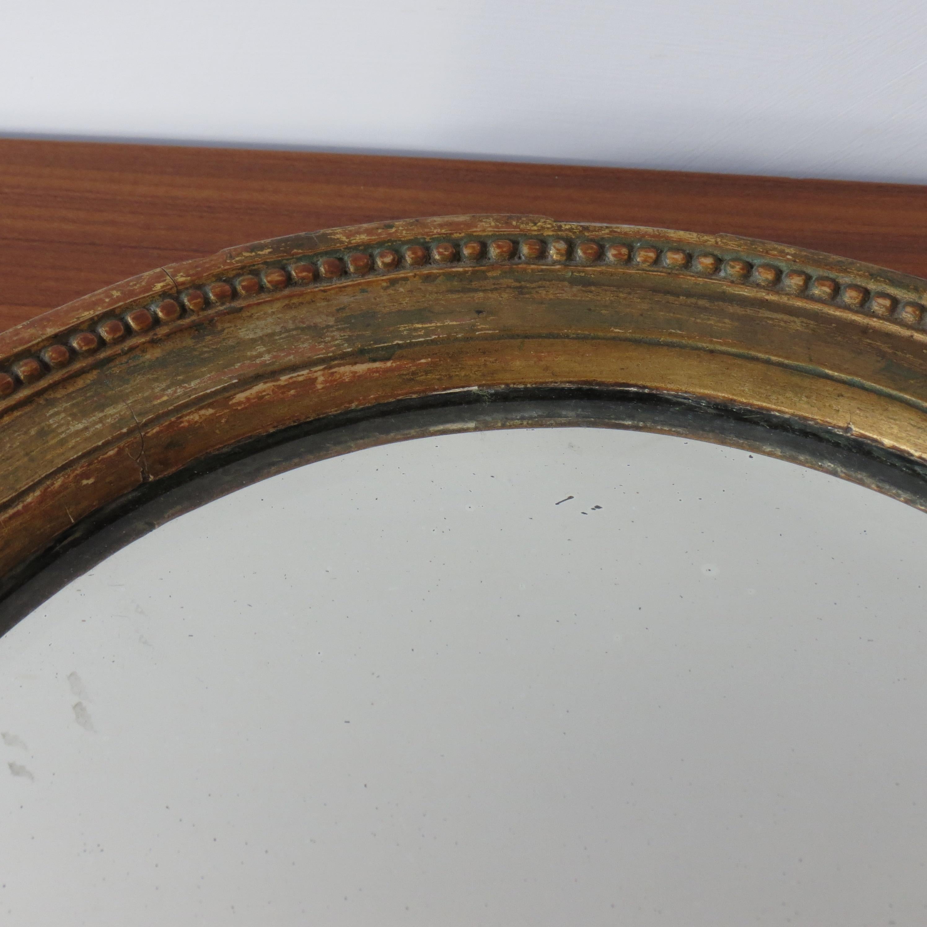 Hand-Crafted 19th Century Late Georgian Oval Gilt Wall Mirror Circa 1830s