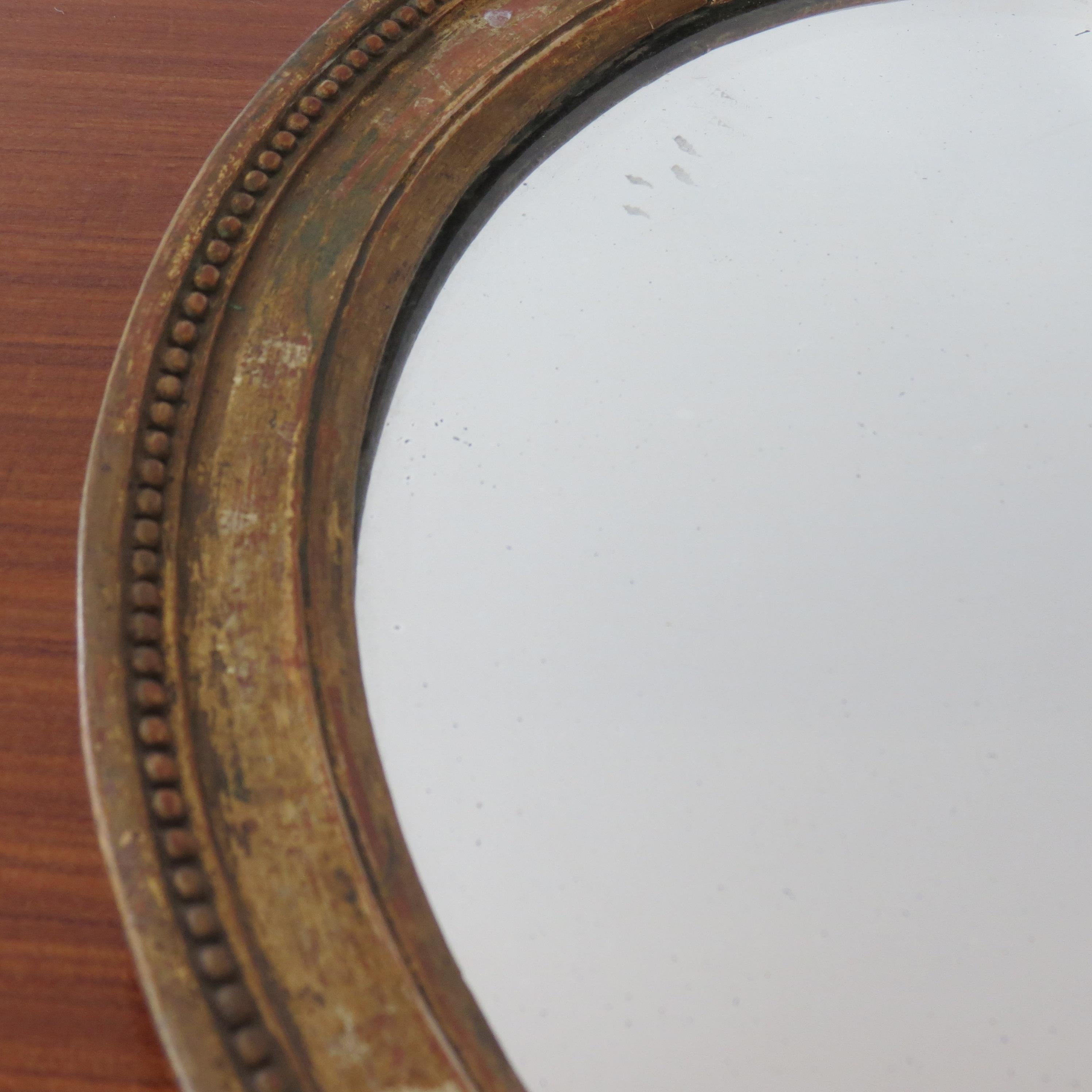 19th Century Late Georgian Oval Gilt Wall Mirror Circa 1830s In Good Condition In Stow on the Wold, GB