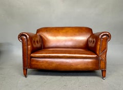 19th century leather drop arm Chesterfield sofa