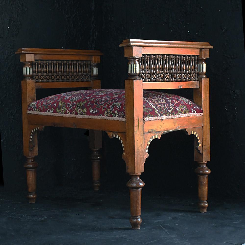 19th Century Liberty and Co Moorish window seat. 
A late 19th Century Moorish window seat of a type retailed by Liberty and Co.
In overall excellent condition. A rich deep colour with lovely decoration. Mashrabiya panels to the arms and original