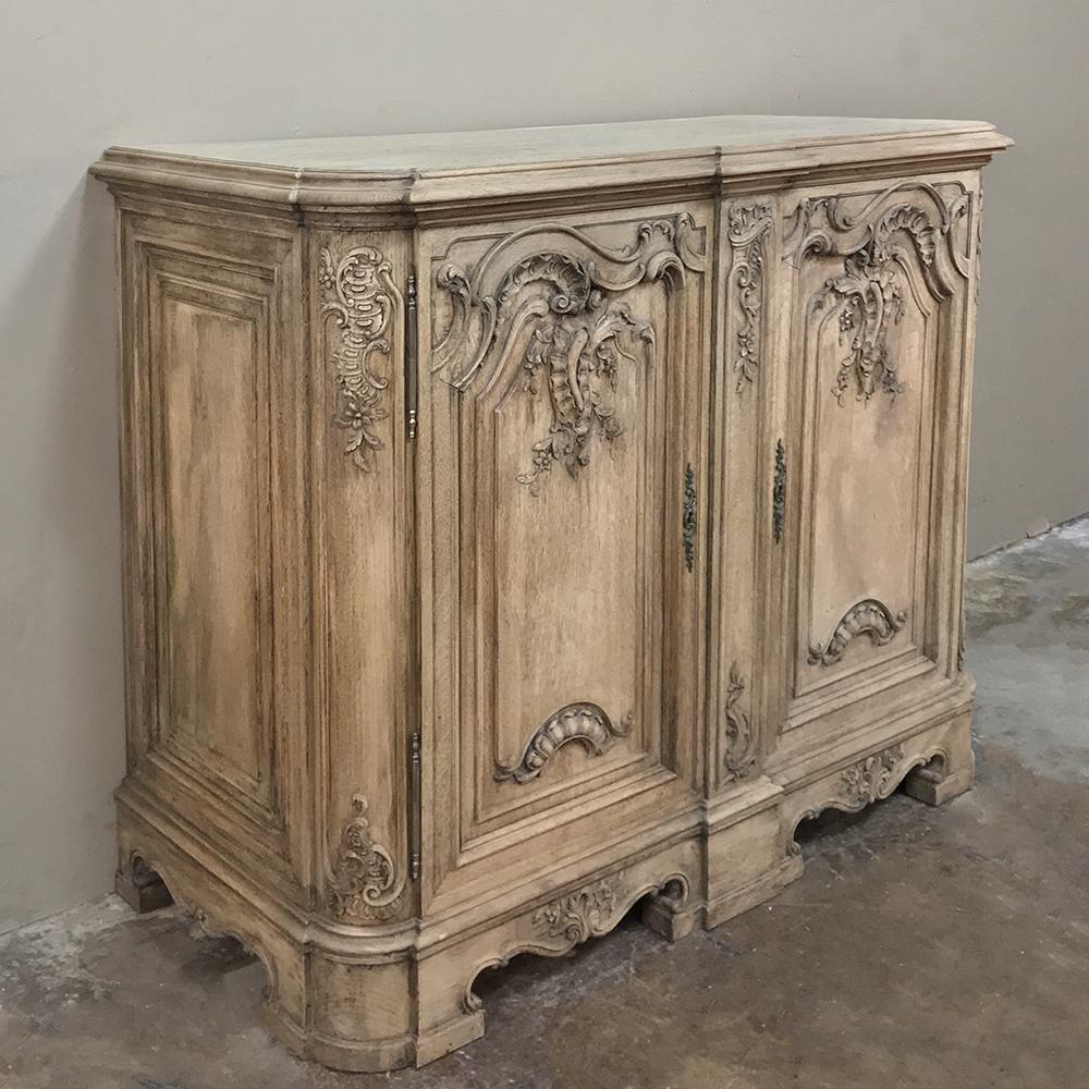 19th century Liegoise Regence stripped oak buffet hails from Liege, considered the source of some of Europe's finest furnishings for centuries. Handcrafted and beautifully sculpted from indigenous oak, it will last for centuries and provide a
