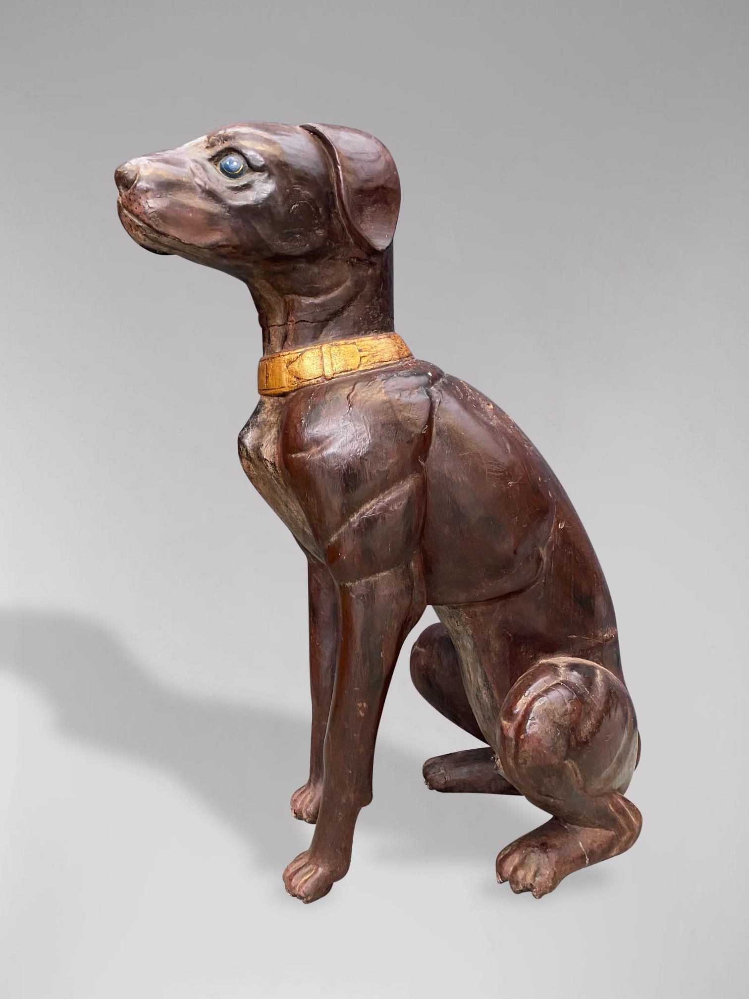 A late 19th century high quality life size leather dog statue with painted eyes and a gilded collar. Great colour and patina throughout. Free delivery for the United Kingdom and the rest of the world.

The dimensions are:
Height: 71cm