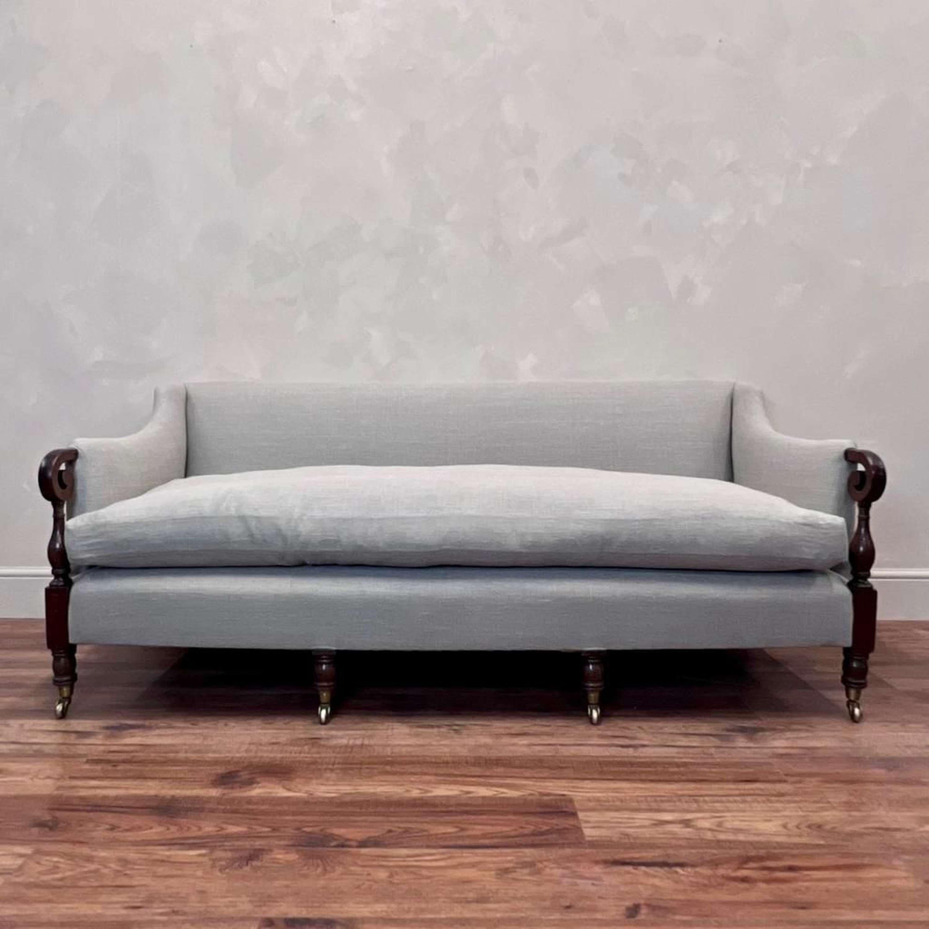 Mahogany scrolled arm sofa.
6 legs with origonal brass castors.
Newly upholstered in quality linen fabric, bespoke large feather squab cushion.
This piece is so comfortable and a great size 


English c1880

Length - 187 cm
Depth - 81 cm
Back Height