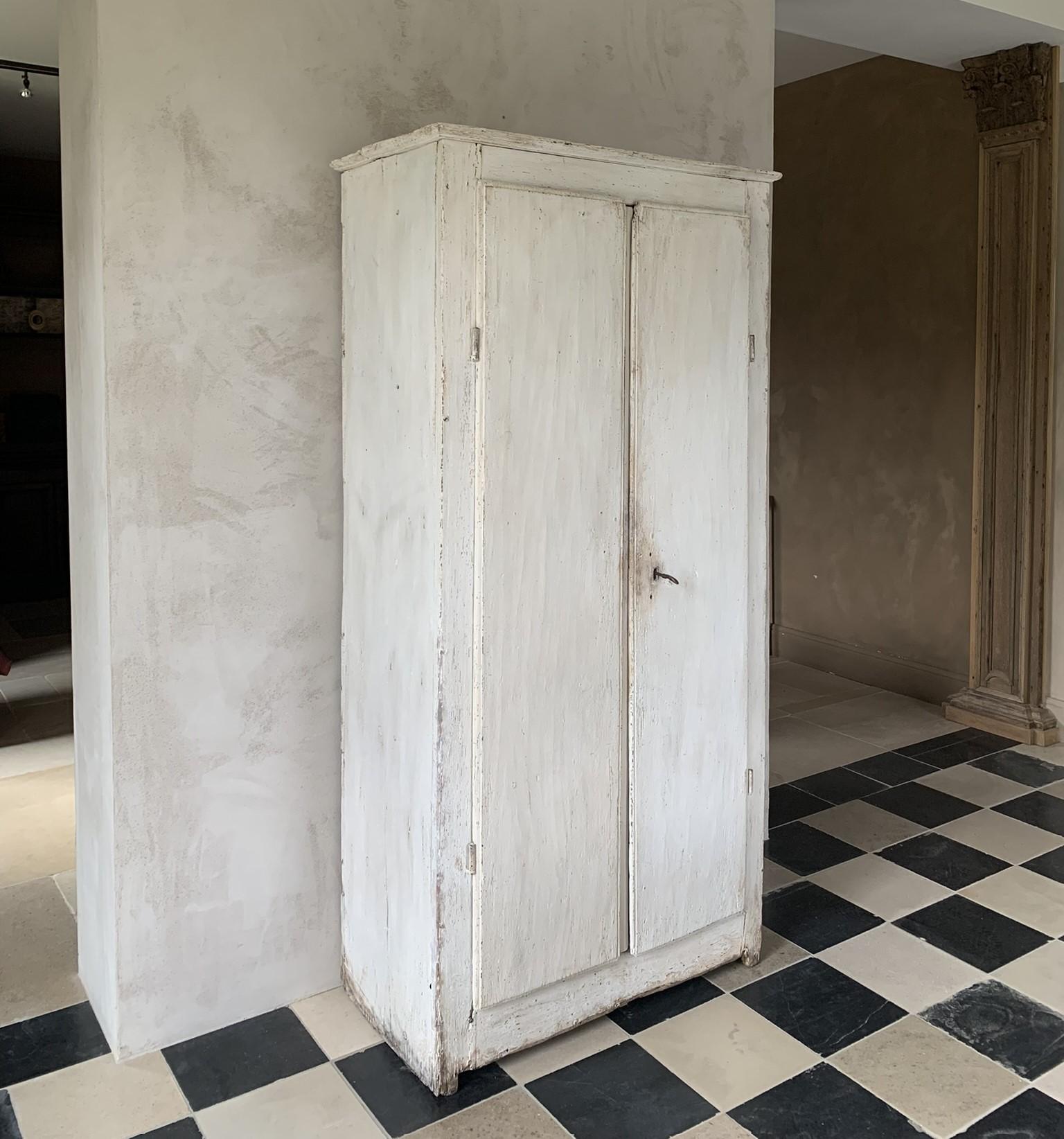 Softwood 19th century linnen cupboard in original white paint For Sale
