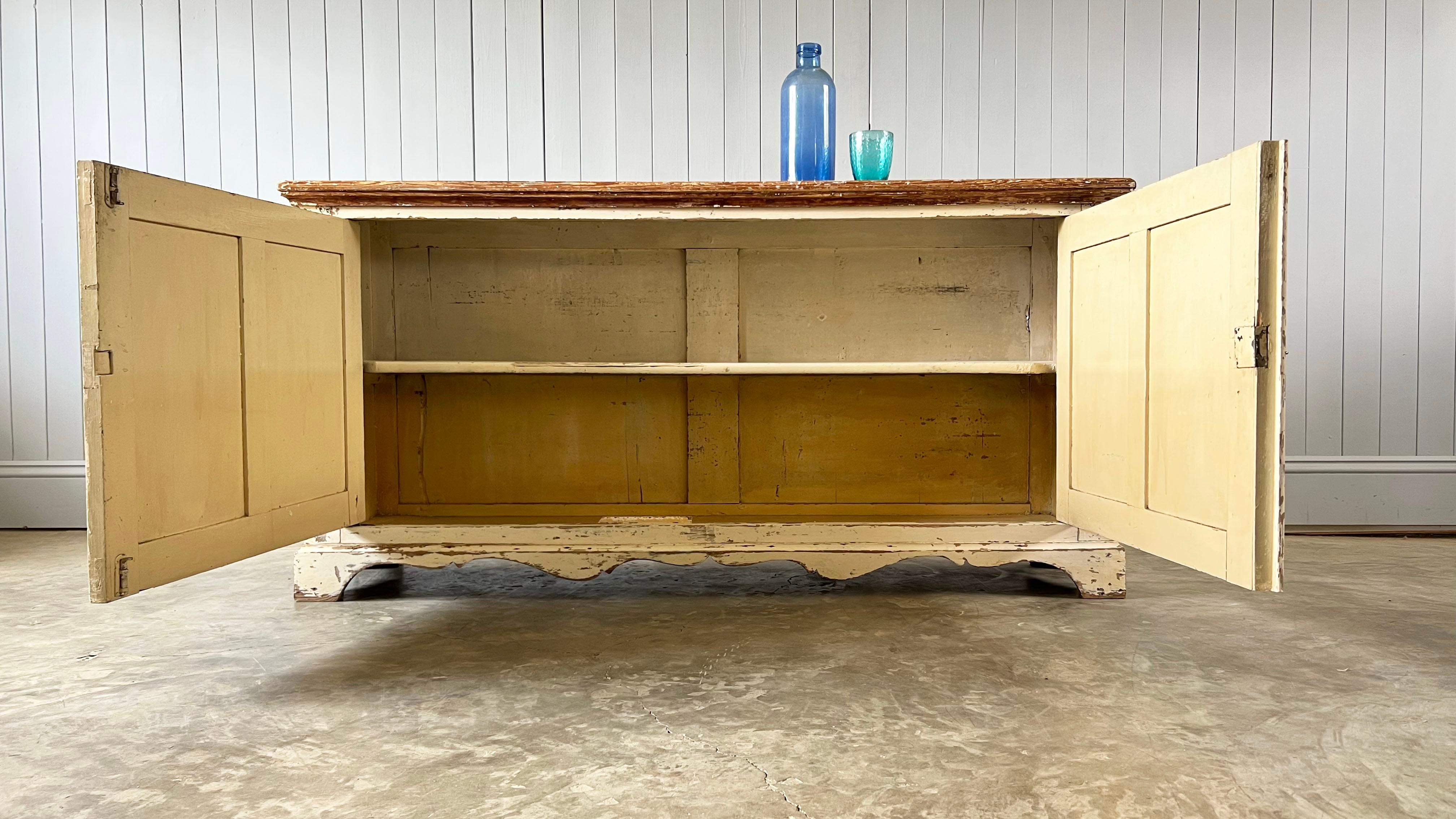 19th Century French sideboard - original inside and out. Creamy coloured original paint which is naturally distressed.

Fantastic patina and just about as useful as it gets. Very easy to place piece in looks and also it's not too big.  Brilliant in