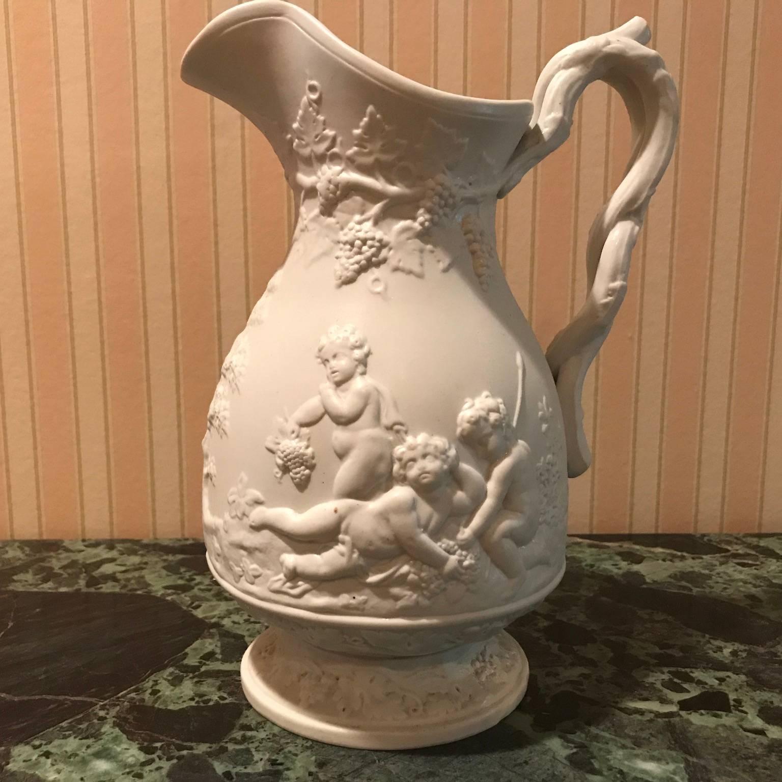19th Century Lot of Four Porcelain Relief Pitchers For Sale 5
