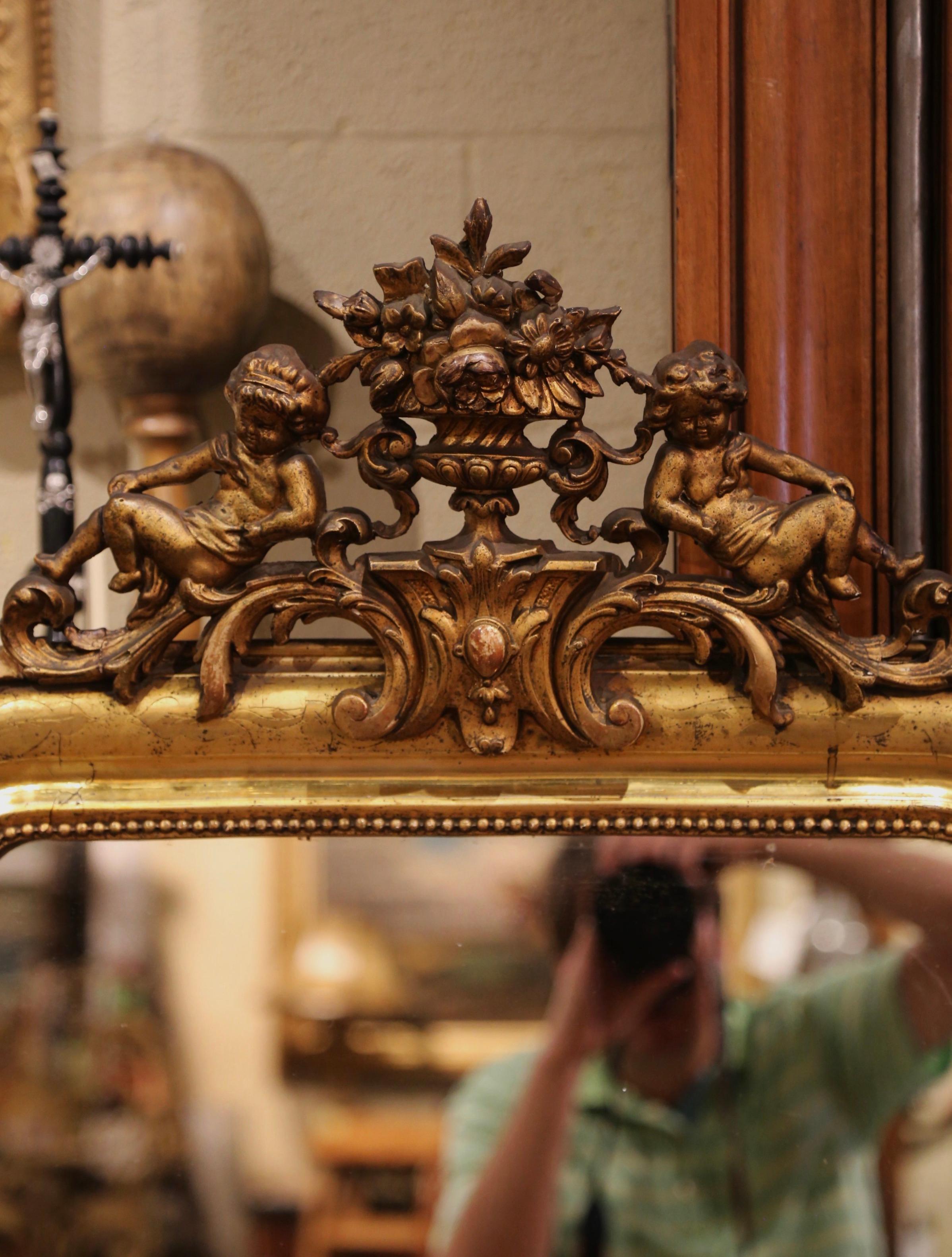 French 19th Century Louis Philippe Carved Giltwood Mirror with Cherub and Floral Motifs