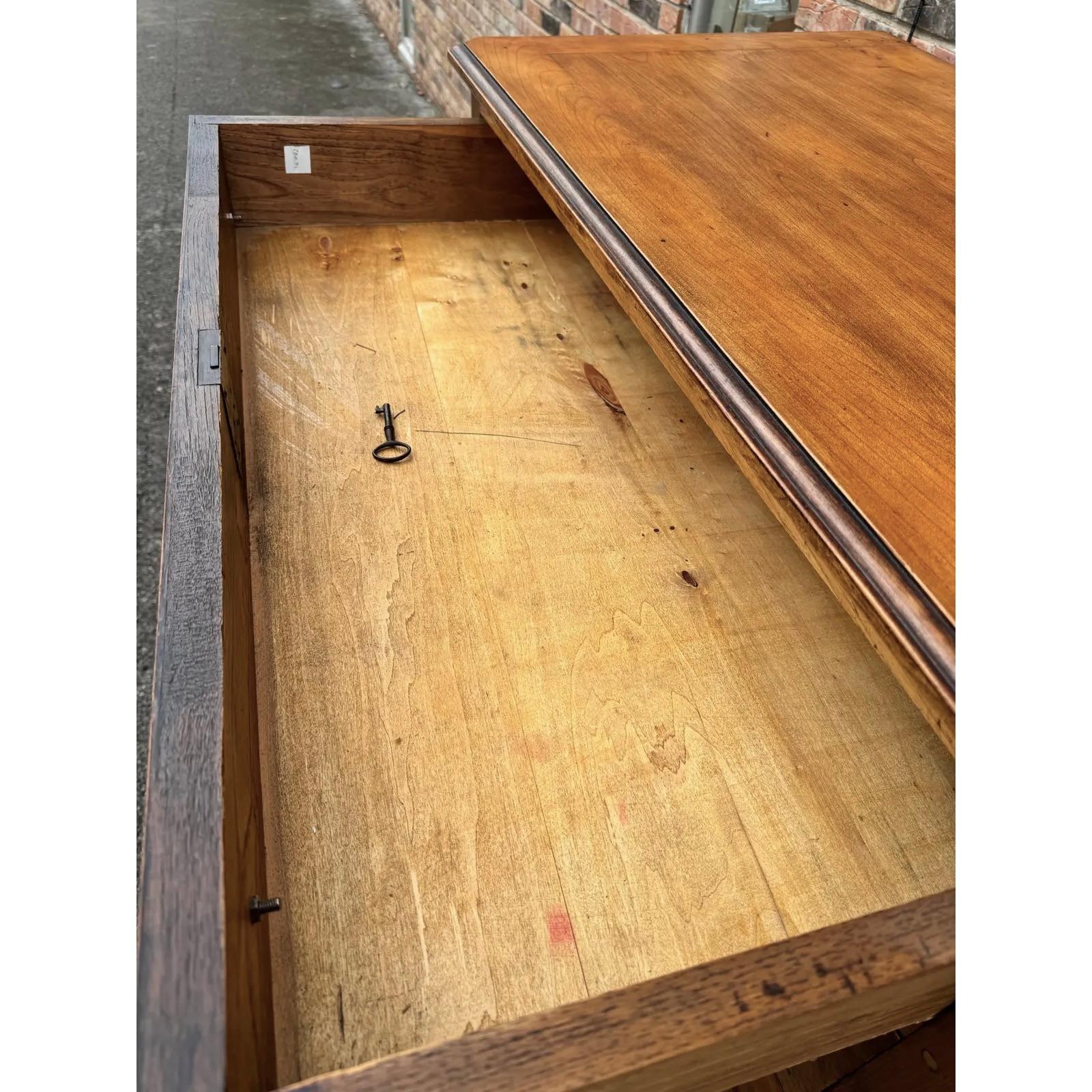 This is a beautiful mid 19th century Louis Philippe chest! The patina and character on this piece is especially good. The natural detail of the wood glows through a warm honey tone. The pulls on this piece make it more unique than the typical wooden