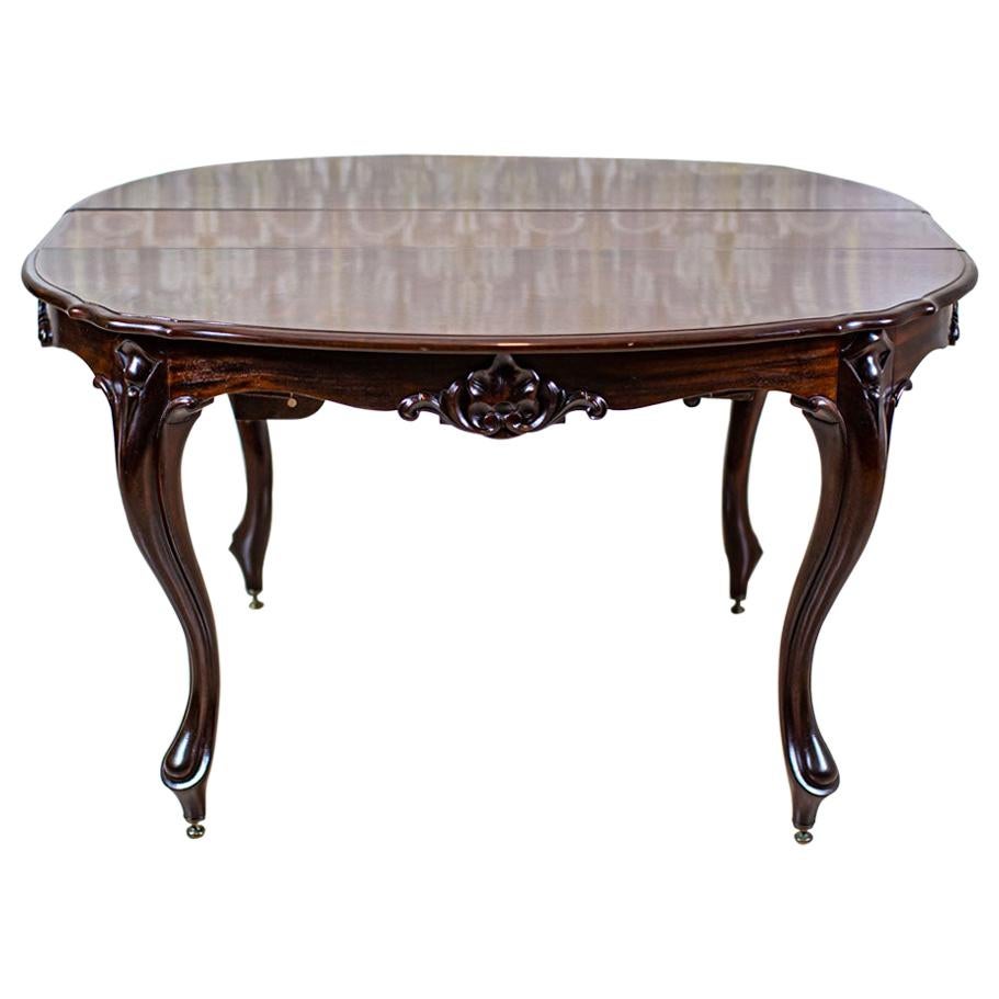 19th-Century Louis Philippe Mahogany Extendable Dining Table in Shellac

We present you this piece of furniture, circa 1860, made in solid mahogany wood.
The extendable top with four extension parts is enough for as much as 16 people.
The legs are