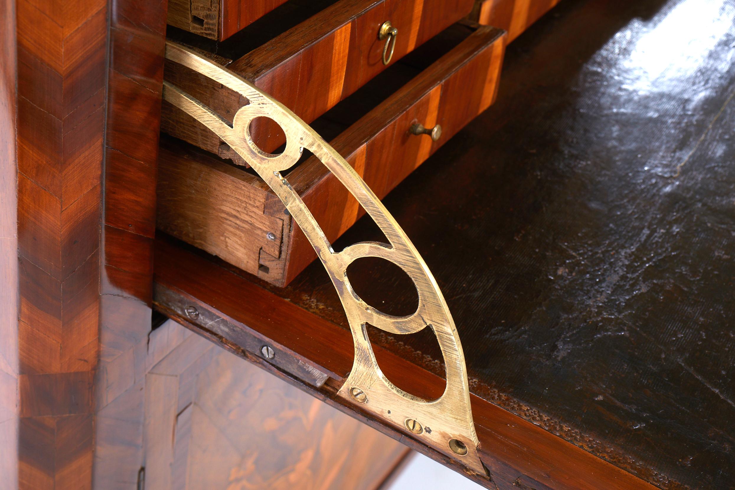 Beautiful craftsmanship Louis Philippe abattant secretary desk in a walnut cherry wood with exterior front inlay with farmscapes, castle and flowers marquetry details. The secretary features lot of storage drawers above fall-front, followed by