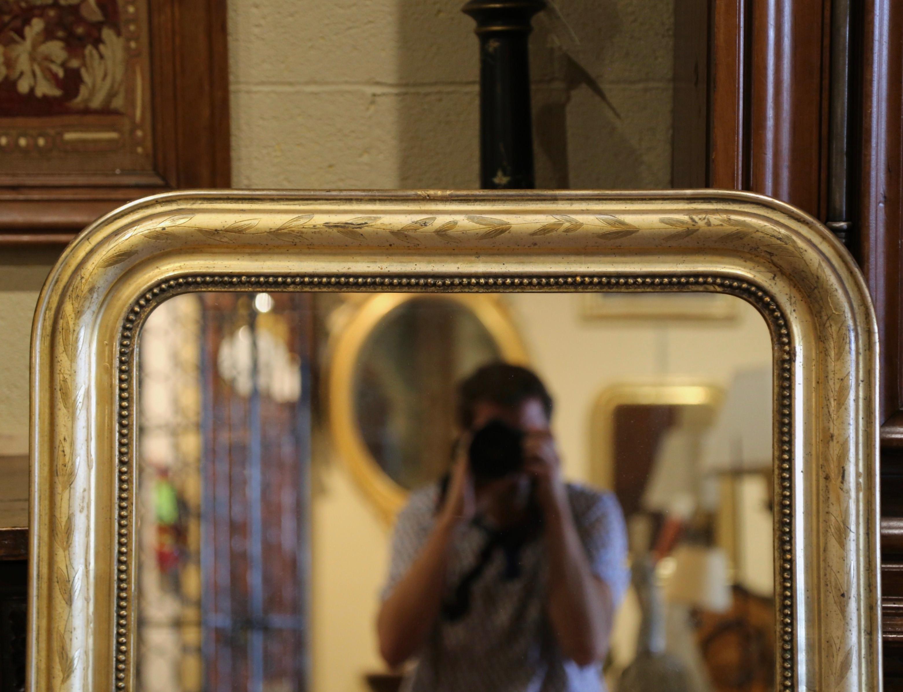 French 19th Century Louis Philippe Giltwood Wall Mirror with Engraved Laurel Leaf Motif