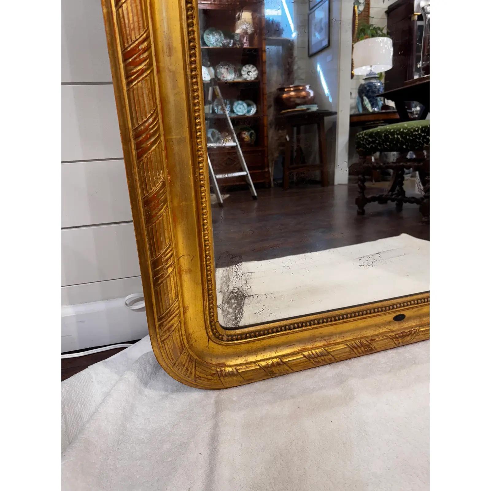 Giltwood 19th Century Louis Philippe Mirror With Crest For Sale