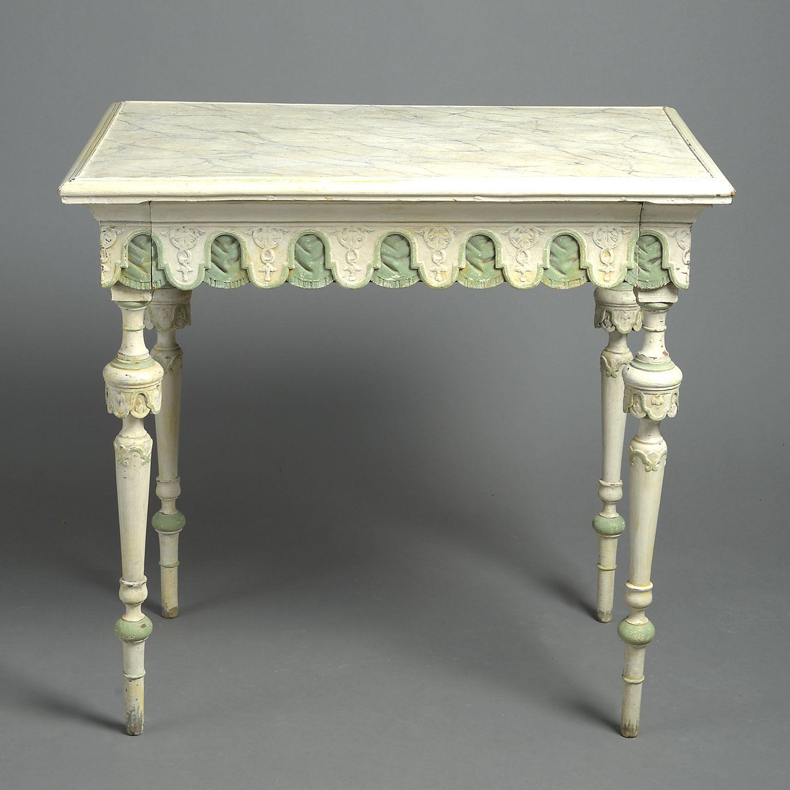 The faux marble-top over the lambrequin-carved frieze with one hidden drawer, raised on turned tapering legs.