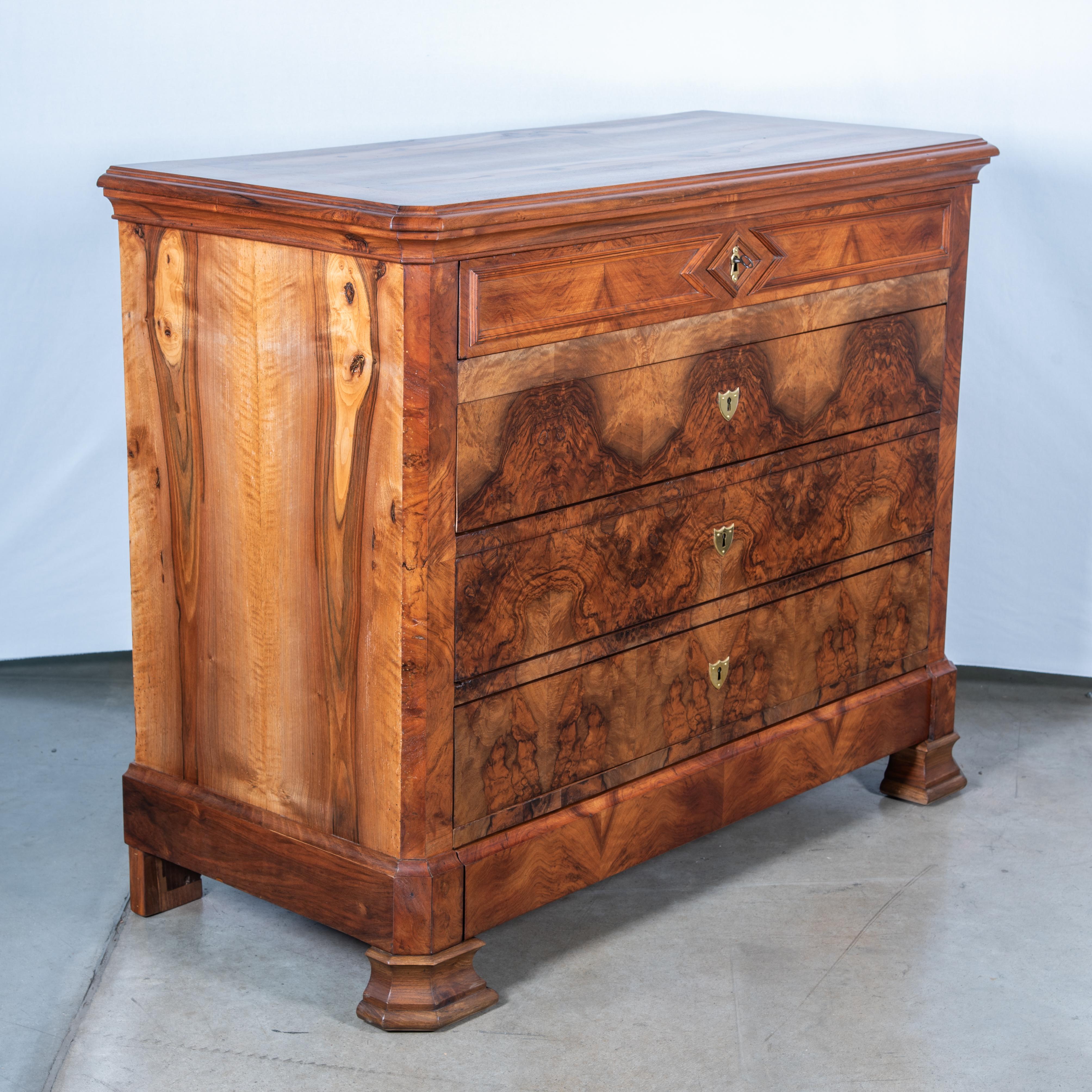 Transform your space with the timeless charm of our 19th Century Louis Philippe Style Commode featuring a sleek wood top. Crafted in the exquisite style of the Louis Philippe era, this commode exudes sophistication and elegance. The rich wood top
