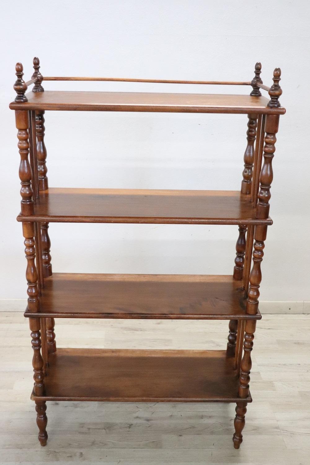 19th century of the period Louis Philippe italian antique étagère. Made in solid poplar wood and characterized by refined turned columns. Equipped with four shelves available to display your objects or books. The distance between the shelves is 30