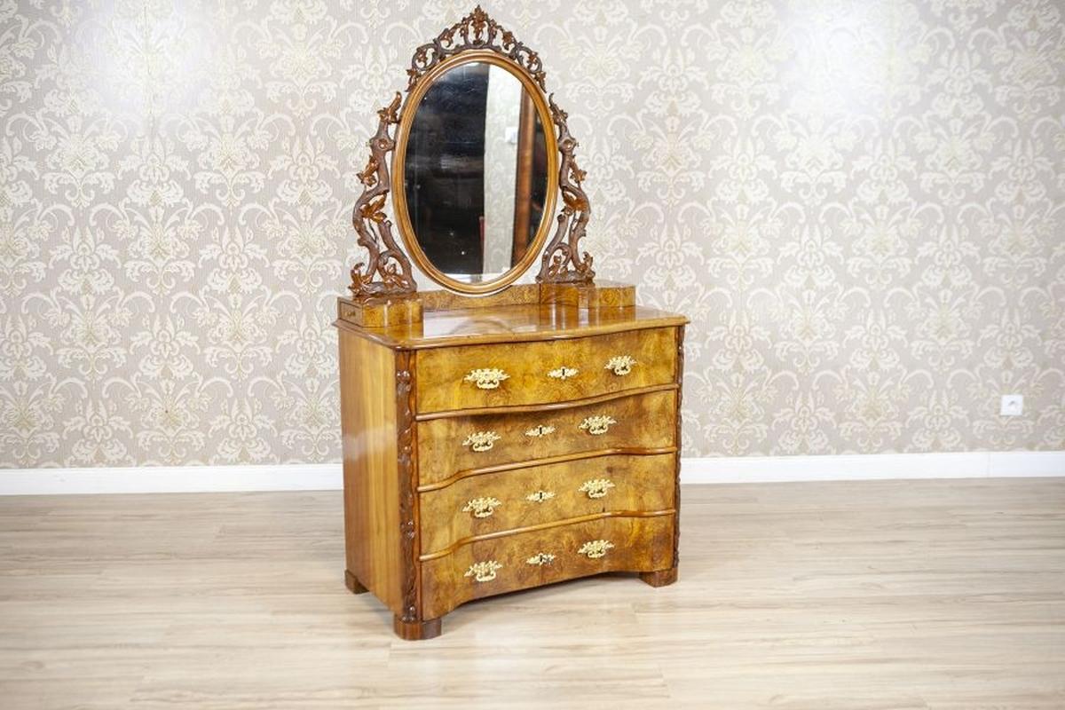 Louis Philippe Walnut Wood & Veneer Dressing Table, Late 19th Century

Step into timeless elegance with this exquisite 19th-century Louis Philippe-style dressing table, a stunning piece that effortlessly combines artistry and functionality. Dating