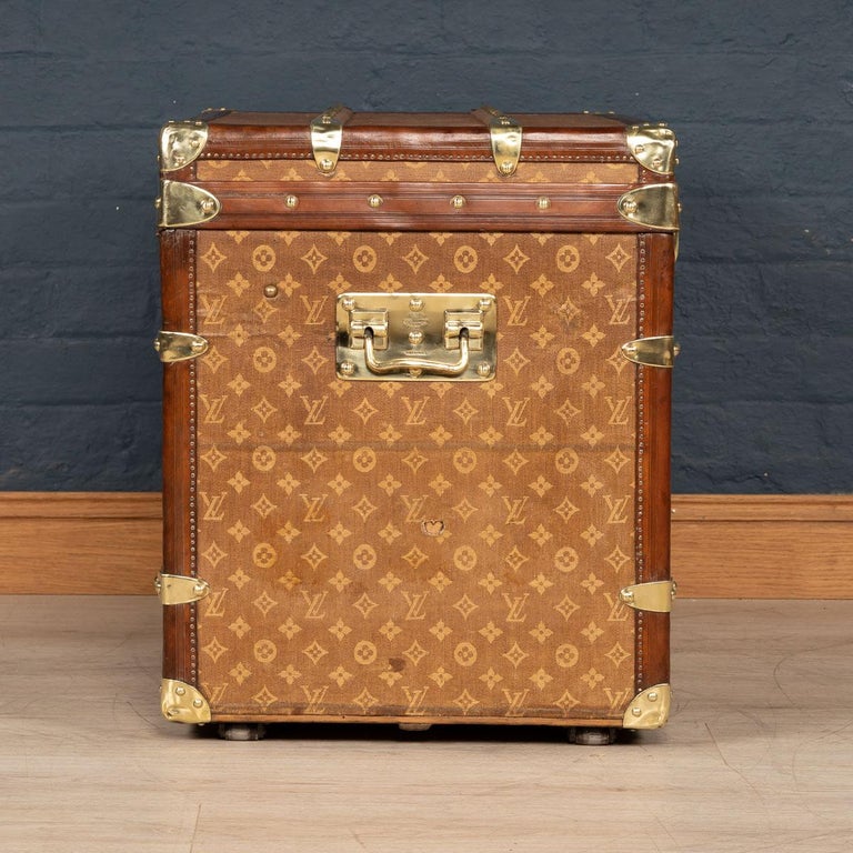 Sold at Auction: An early 20th century Louis Vuitton trunk, the lid with a  brass plaque inscribed 'Princess Victoria of Schleswig Holstein', with LV  logo embossed cloth covering, timber straps and leather