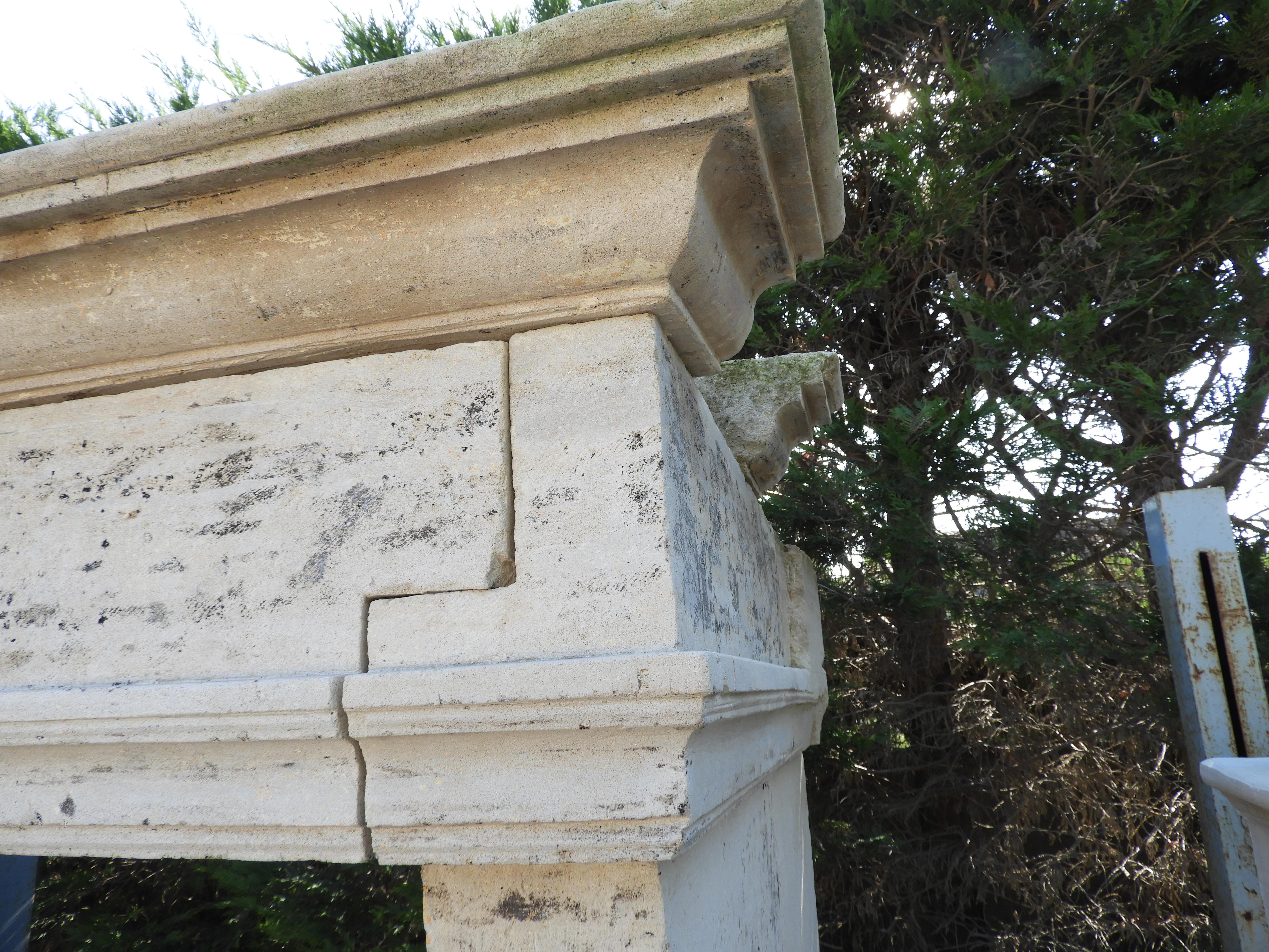 19th century Louis XIII French limestone fireplace, light cream colored.
The paint was removed by hand not to damage the surface of the stone.
All restorations that need to be done are included in the price, so when delivered it will be ready to