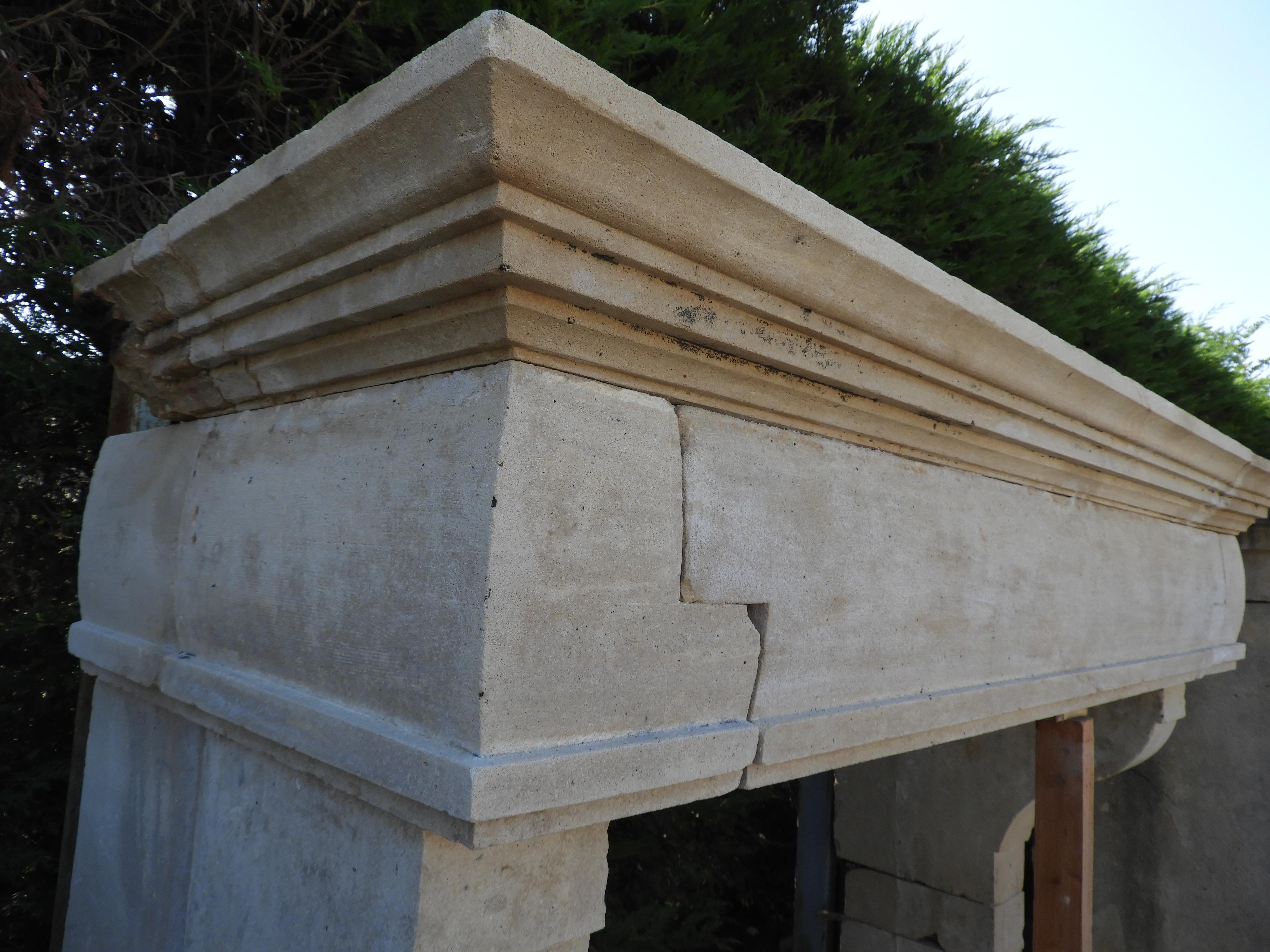 19th Century Louis XIII French Limestone Fireplace with Curved Front 4