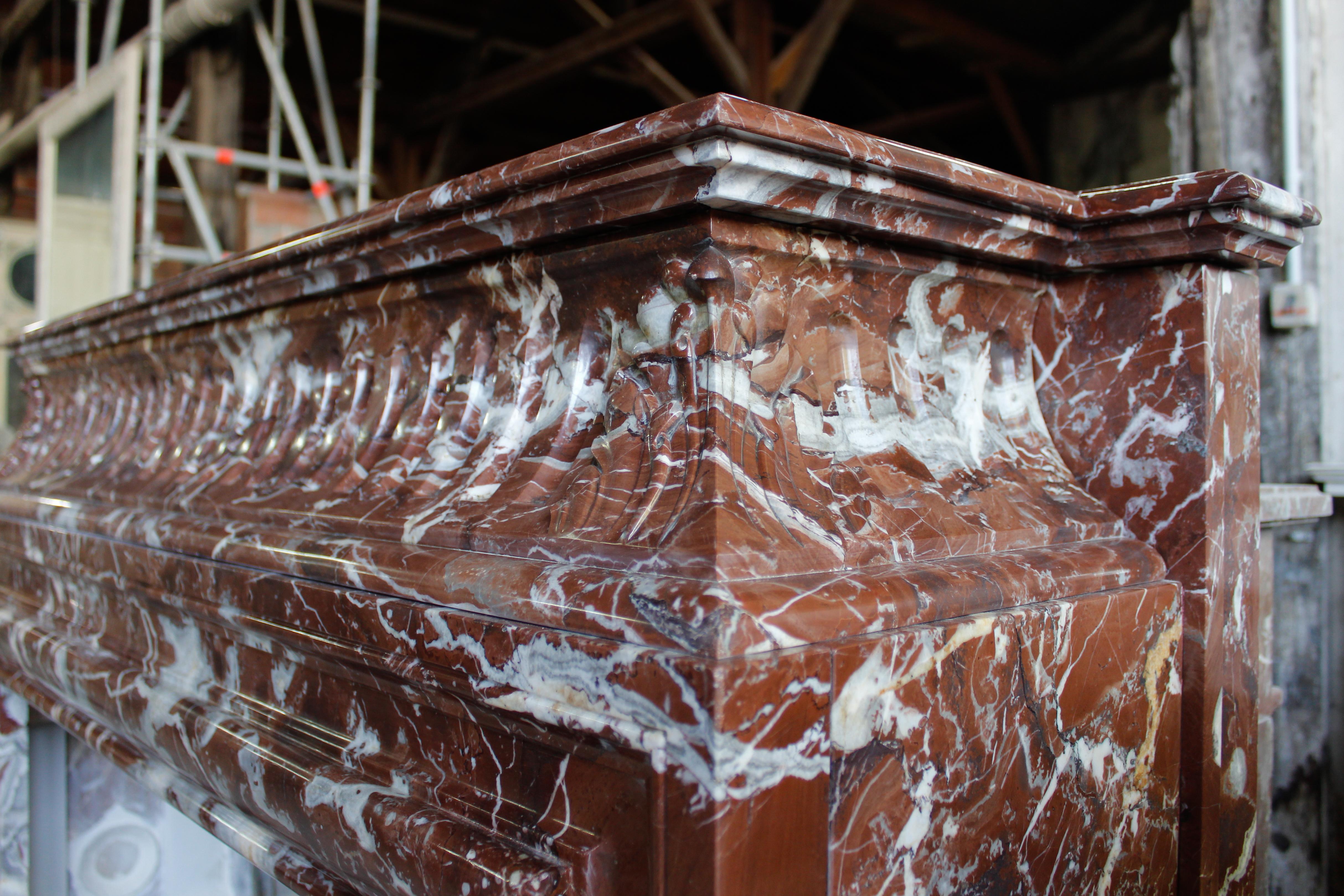 Carved 19th Century Louis XIV Style Fireplace in Belgian Rouge Griotte Marble For Sale