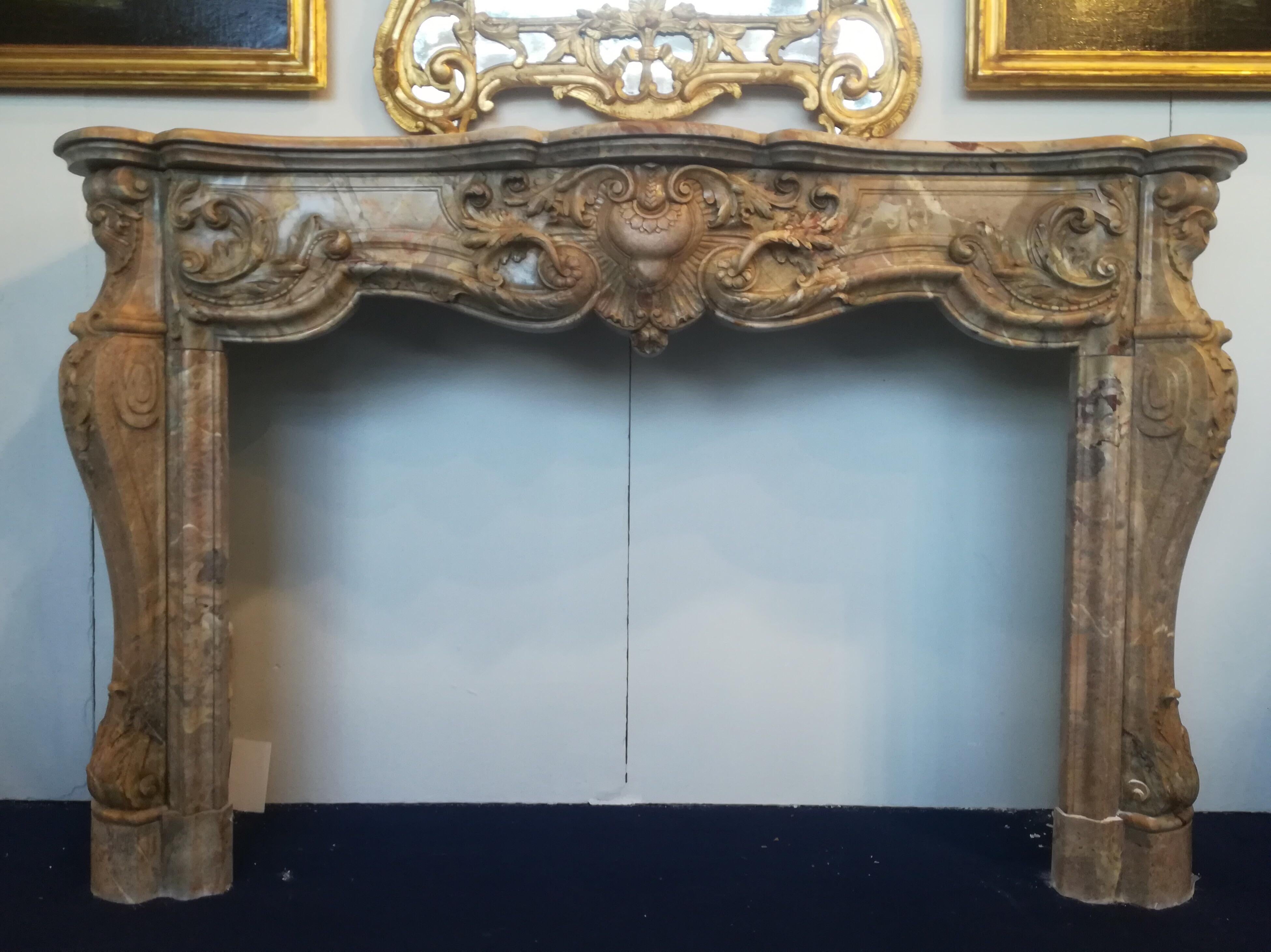 Louis XIV style, 19th century, (XIXth century) 
Superb and rare model of fireplace mantel made in Sarrancolin Fantastico marble. 

Dimensions of the fireplace hearth : width : 130cm / height : 87cm

