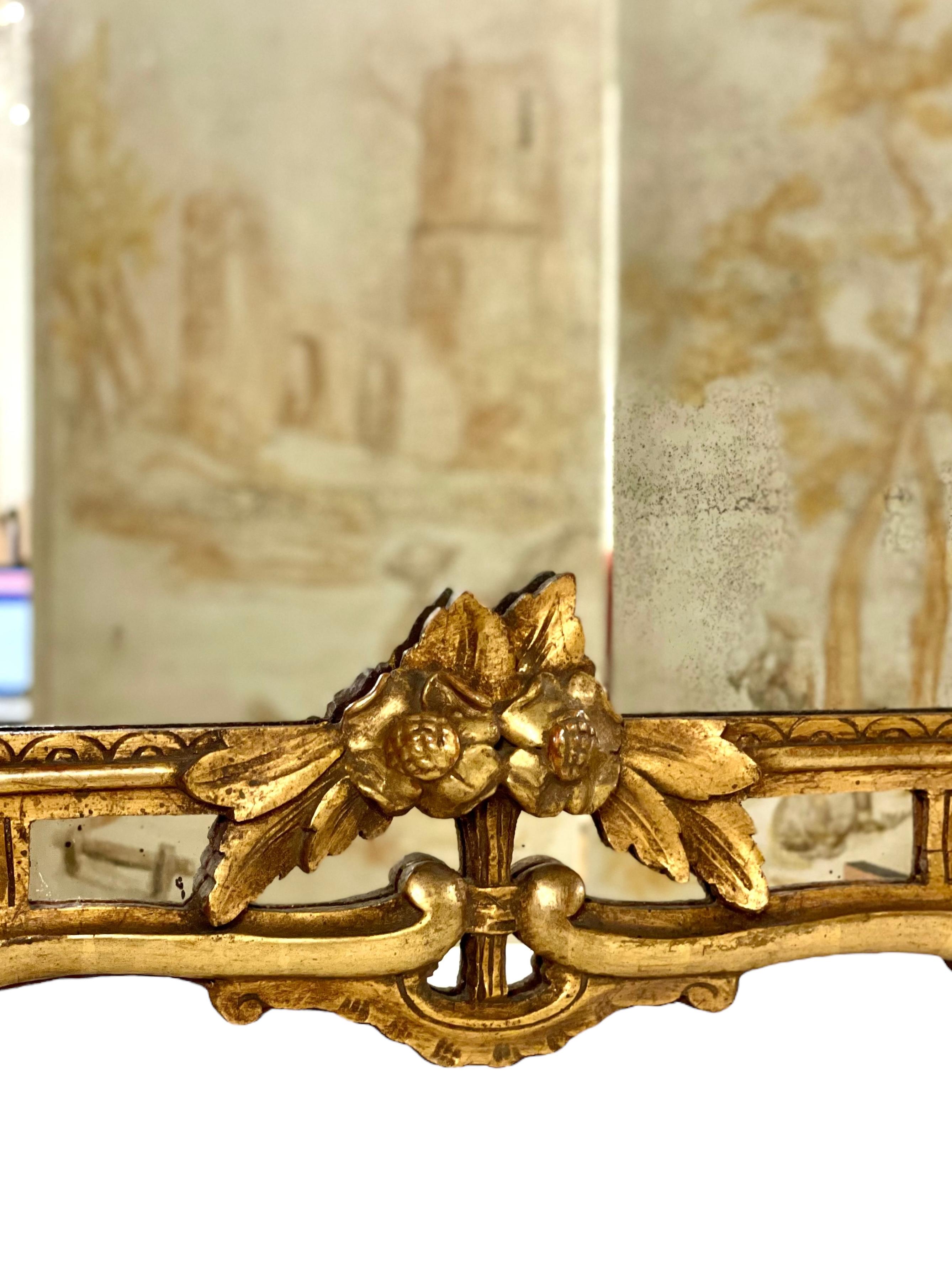 Français Miroir de cheminée en bois doré Régence du XIXe siècle en vente