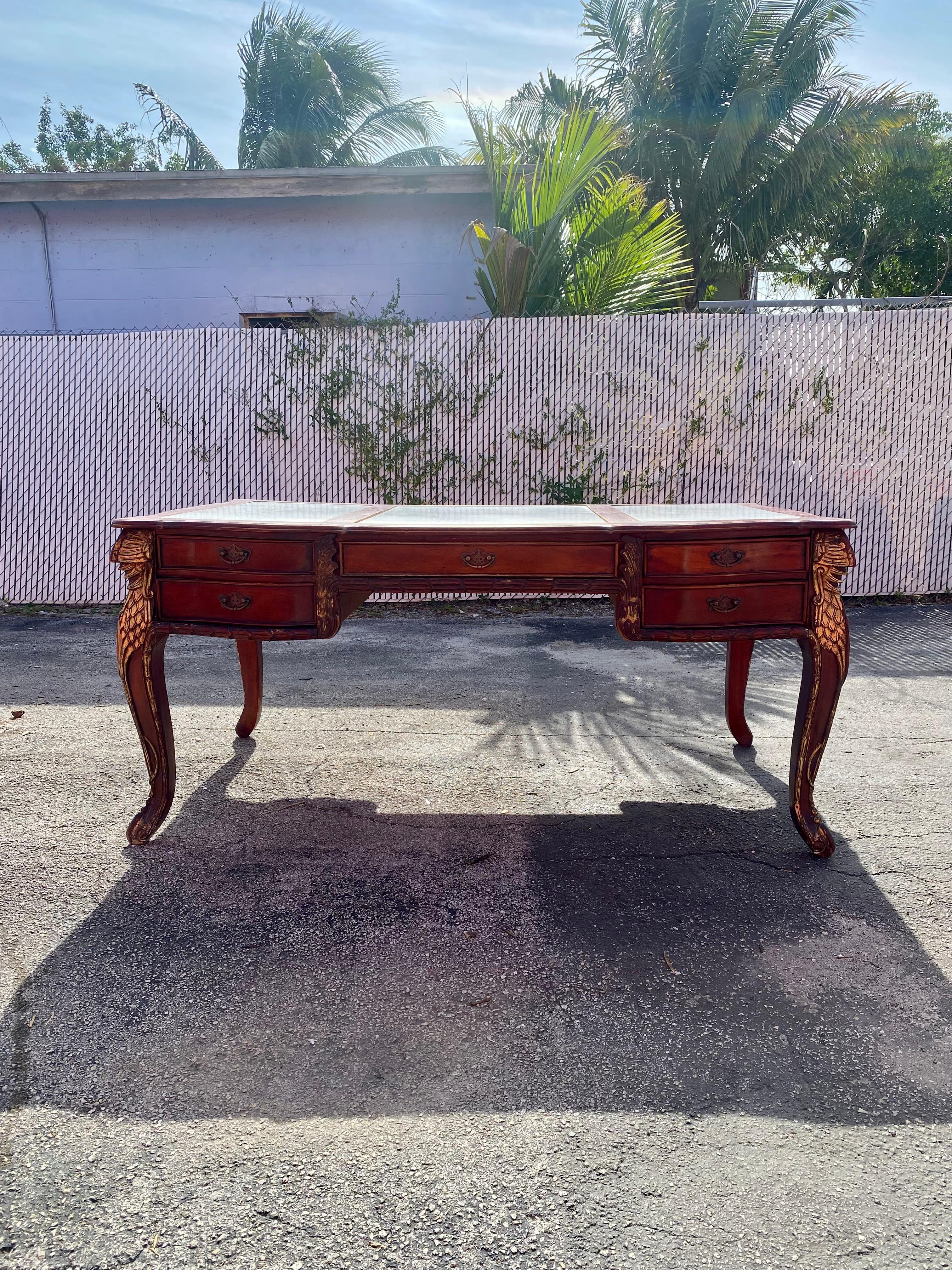On offer on this occasion is one of the most stunning, one of kind, Louis marble wood desk you could hope to find. No bronze details like the standard desks. This is a rare opportunity to acquire the most spectacular, solid hand carved wood and