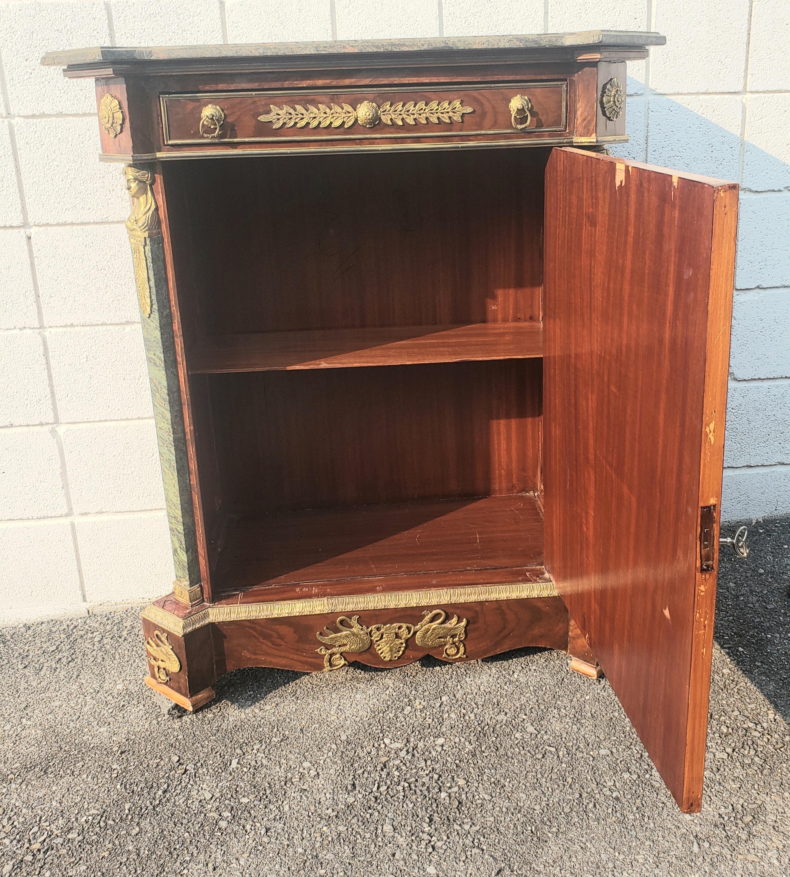 A fine 19th Century Louis XV Style Ormolu Mounted on Burl Kingwood with Marble mounts and Top Cabinet. Great as a bar cabinet. Comes with a functional key. Meaures 37