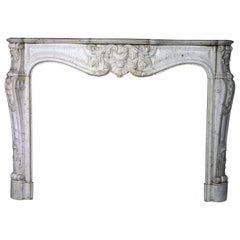 Cheminée Louis XV du 19ème siècle en marbre sicilien
