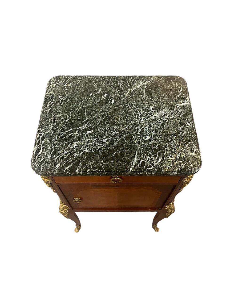 19th Century Louis XV Side Table Nightstand with Verde marble top. The inside of the door section is lined with Carrara marble. Has bronze mounts with bronze paw feet