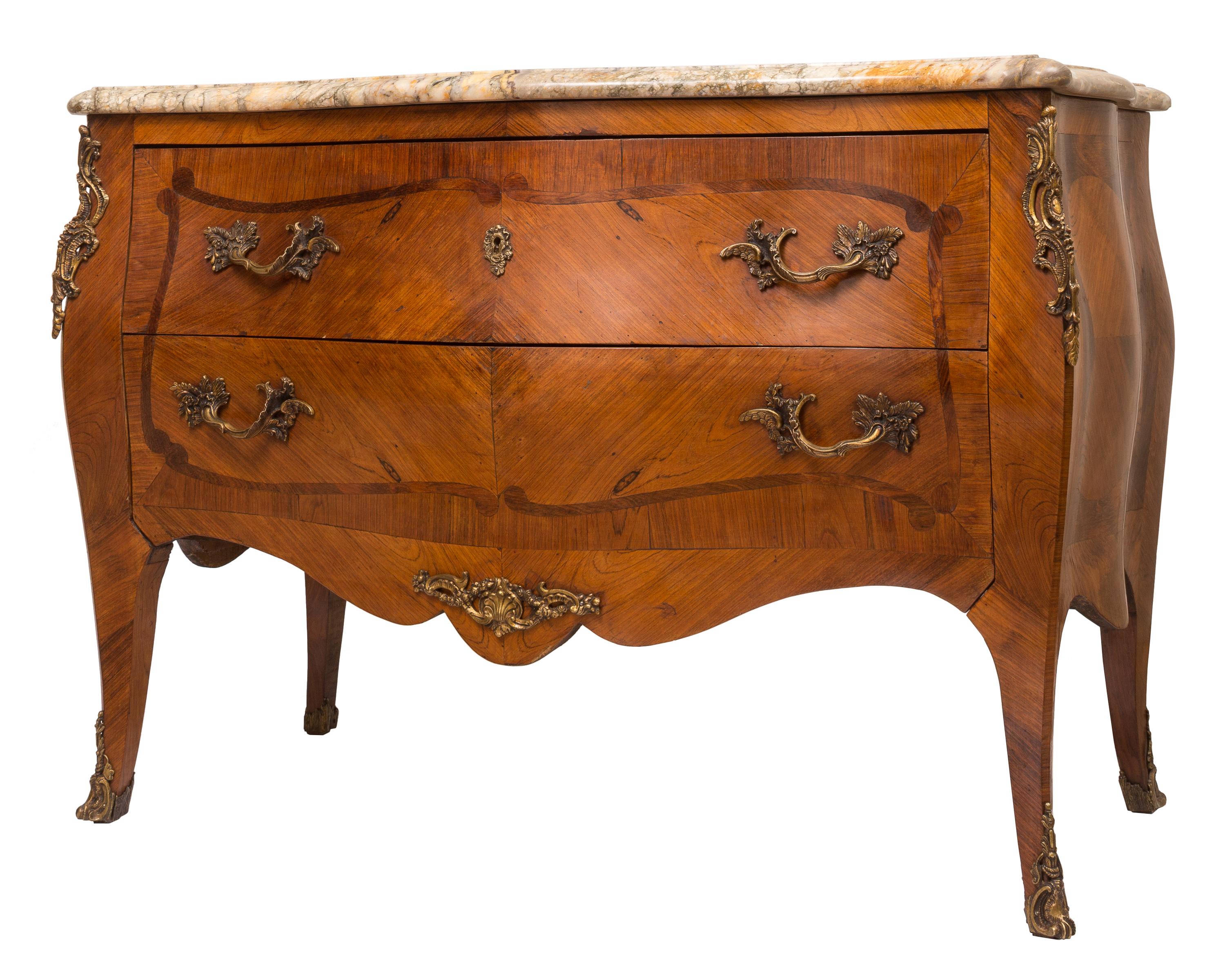 A nicely proportioned 19th century French Louis XV style bombe commode, featuring elegantly curved front and sides embellished with marquetry inlay and ormolu bronze fittings. Topped with a single marble slab, it has two spacious drawers making it a