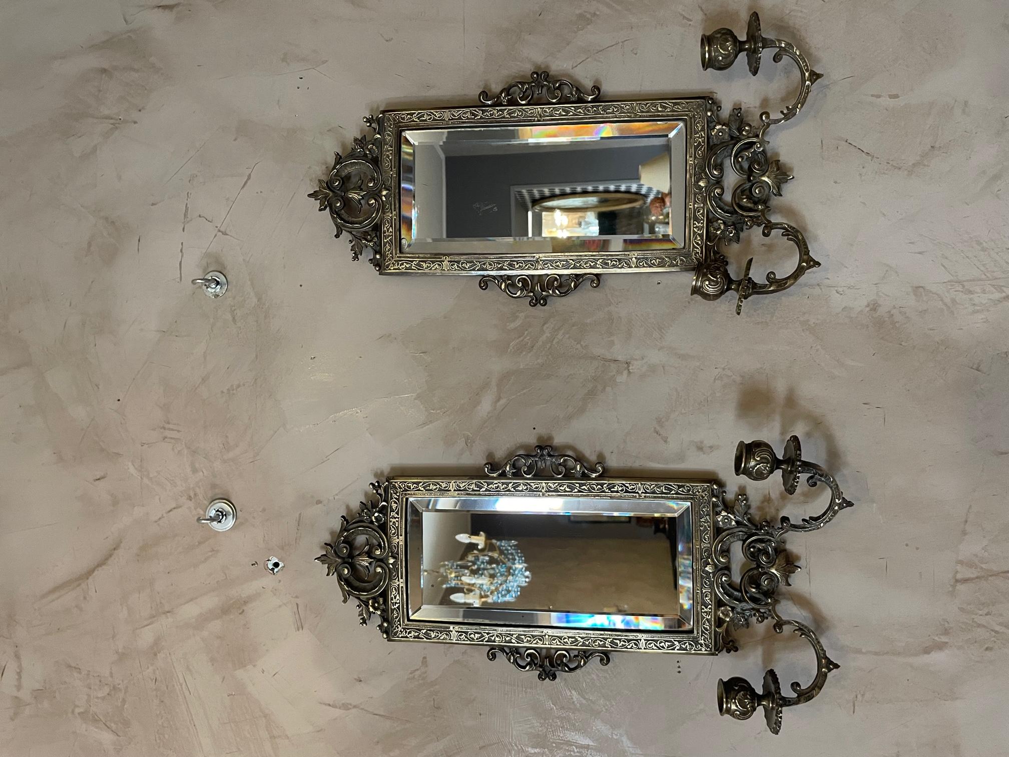 Very nice and rare 19th century French Louis XV style bronze candle holder mirror. The mirrors is beveled. 
Flower decoration. Nice quality and condition. 
Hook at the back to hang the mirrors. 