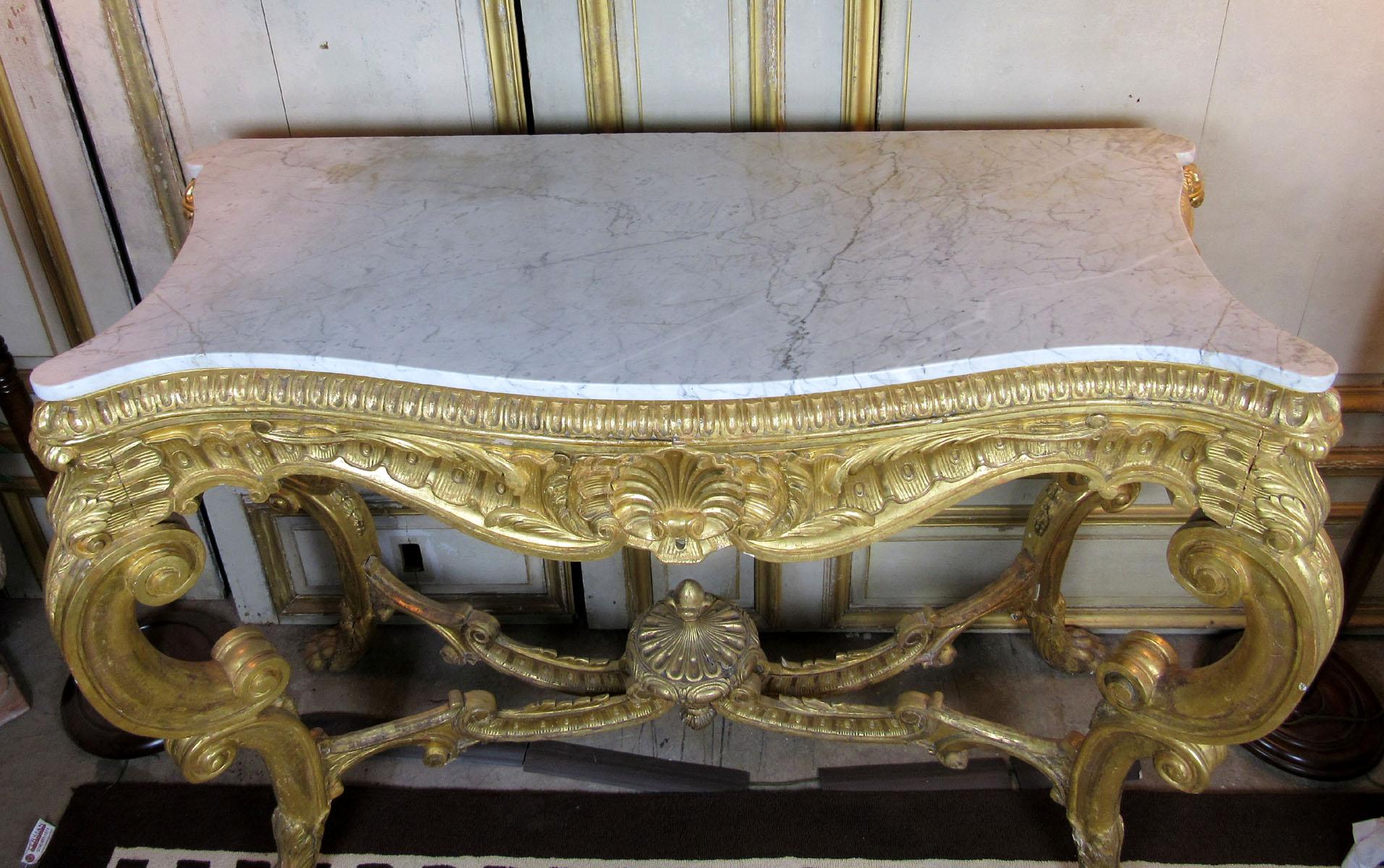 Very large and tall Louis XV style four-legged giltwood console with Carrara marble top.
Restored gilding and marble.