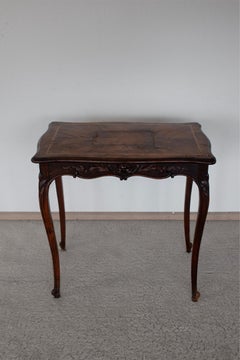 19th Century Louis XV Style Dark Wood Table with Floral Ornamental Carvings
